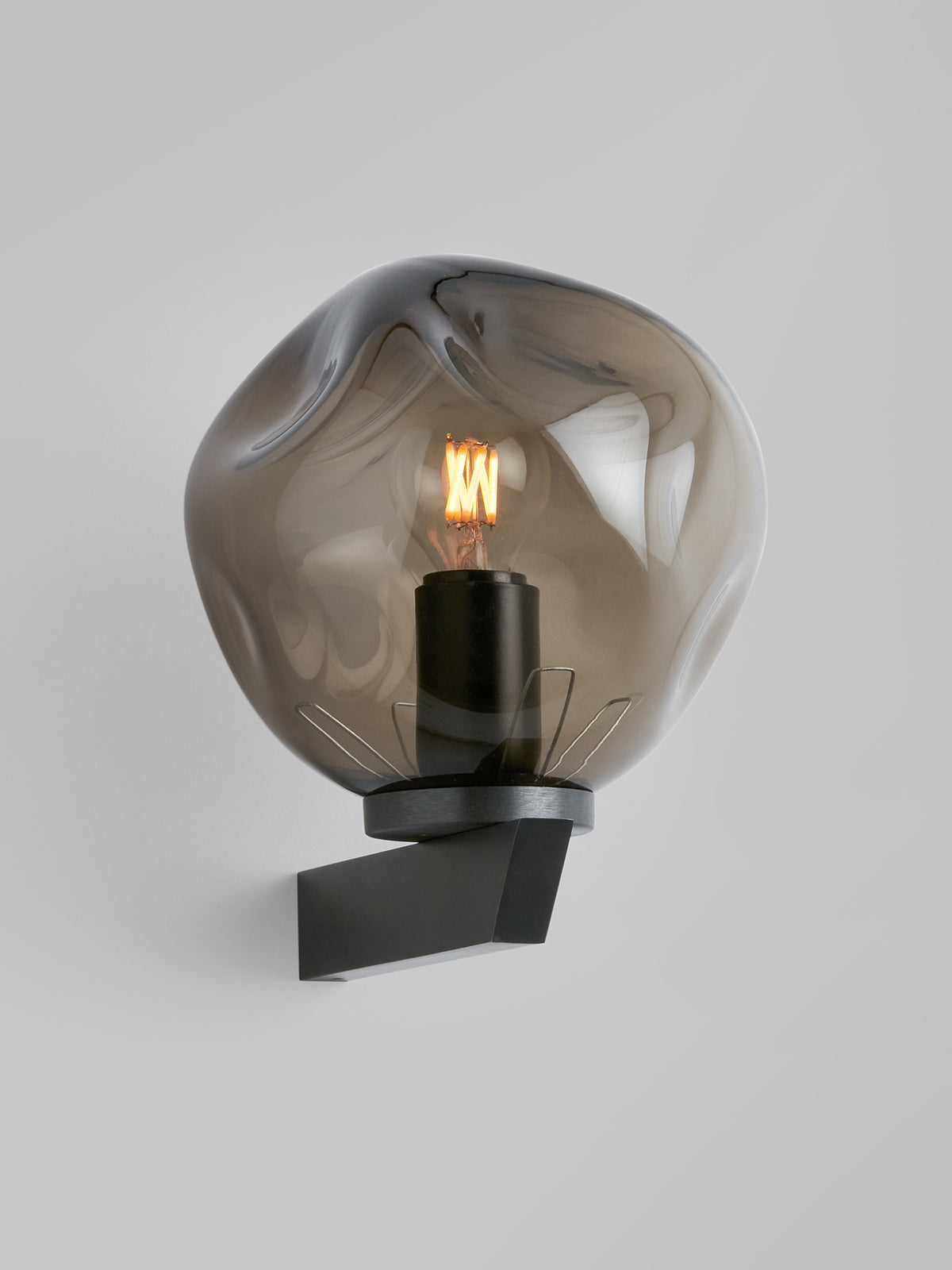 GAIA Wall - Flush — side angle showing smoky glass and black mount