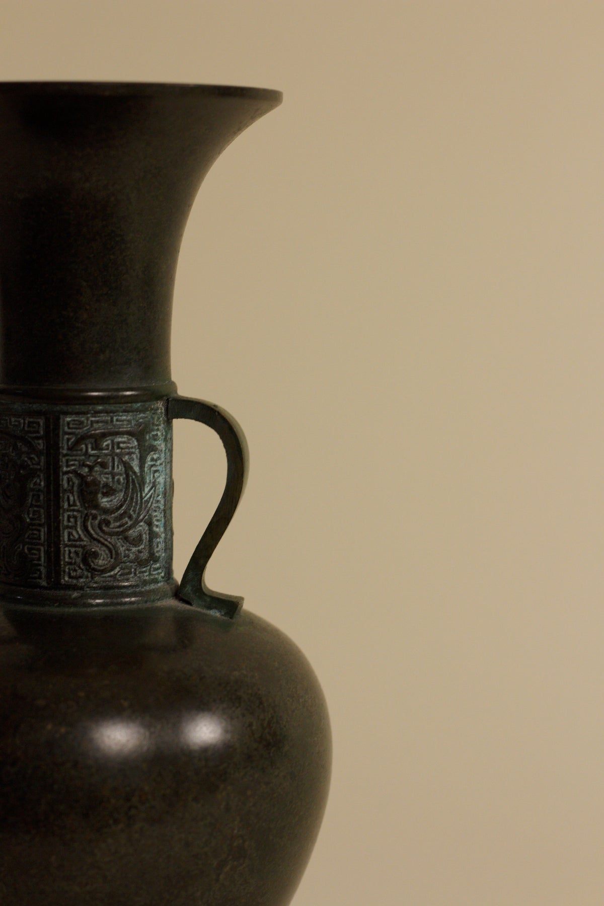 Japanese Patinated Bronze Vase – Geometric Relief Twin Handle — detail view