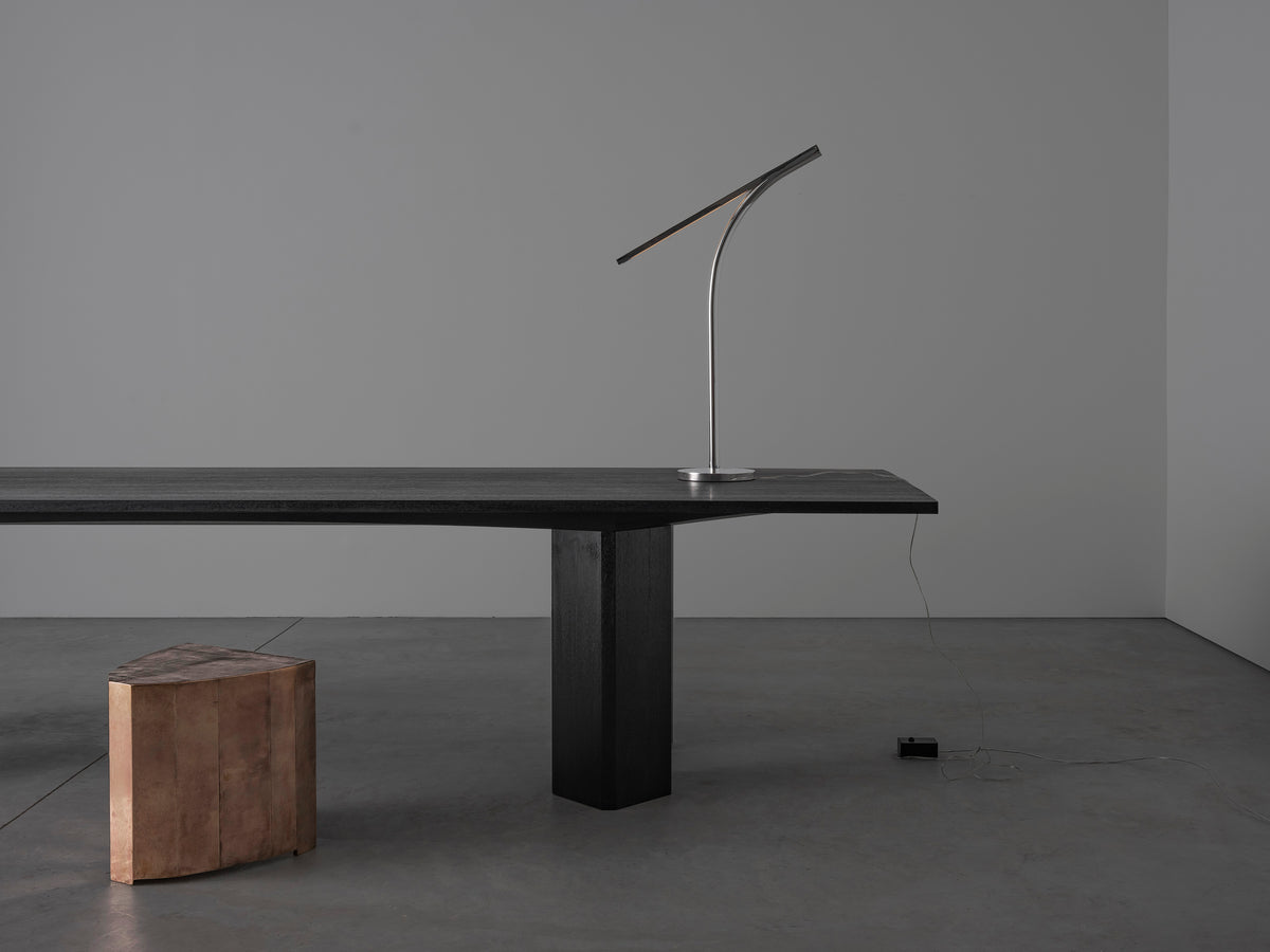 Corps - Dining Table — modern black wood table in minimalistic setting