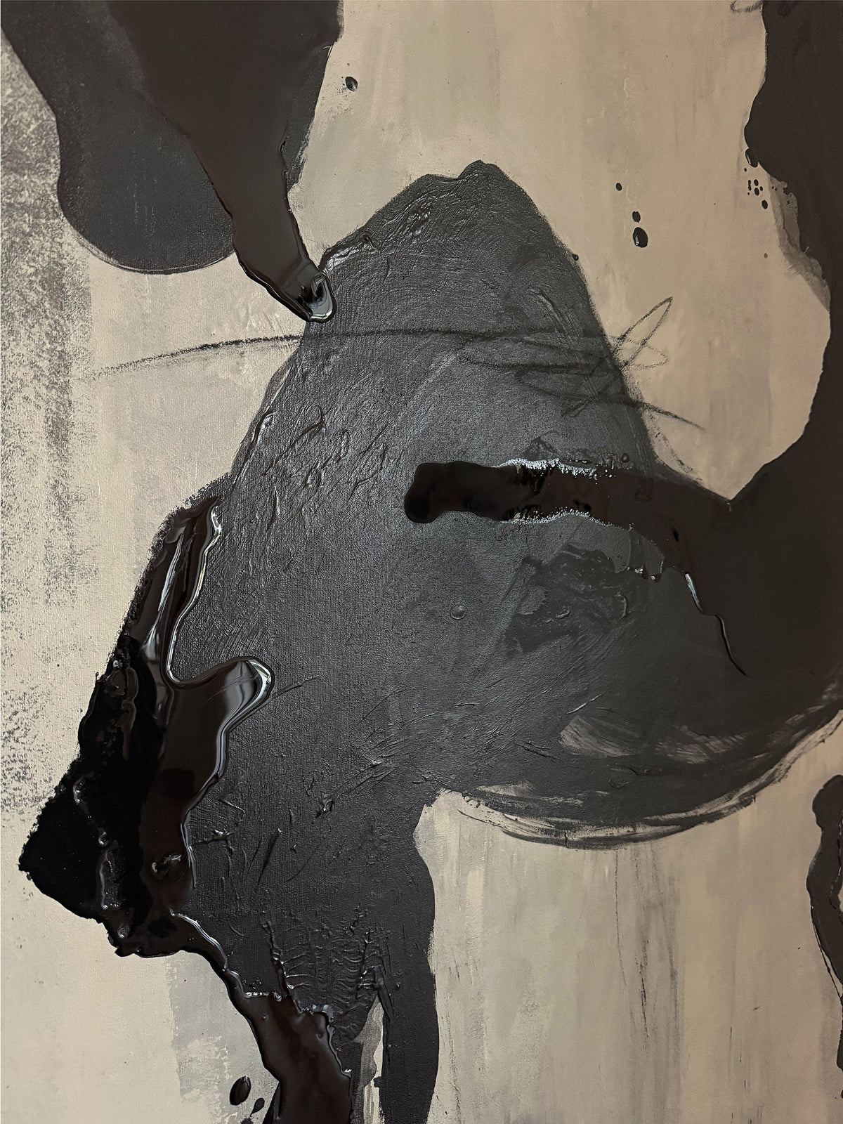 Black Drift - Painting by STUDIOPOLS features bold, textured black brushstrokes and splatters on a gray-beige background. Dynamic shapes overlap and flow across the canvas in rich acrylic paint, creating striking contrast and movement.