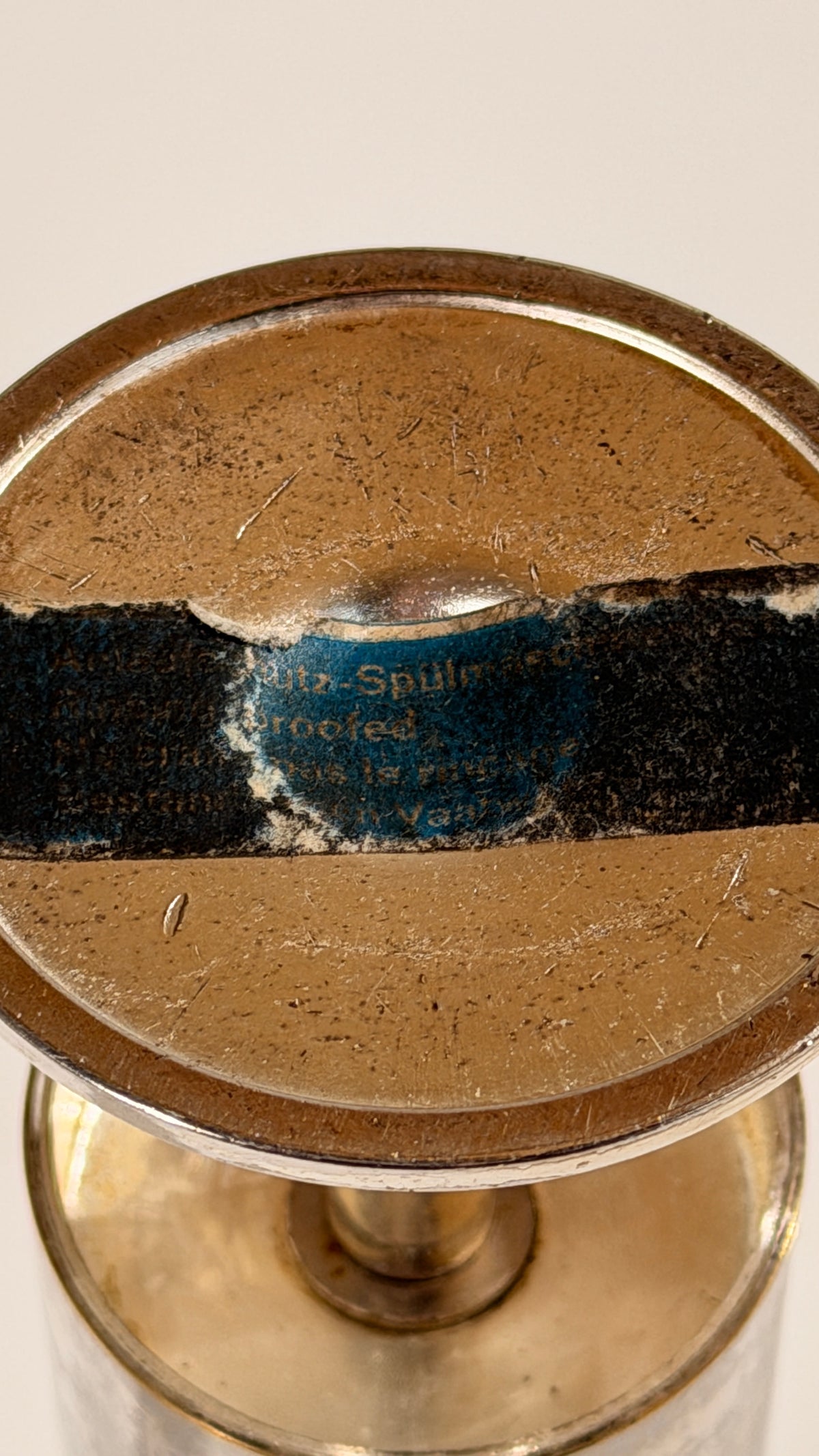 Large Silver-plated Metal Candleholder, France, circa 1970. — underside view showing label and wear