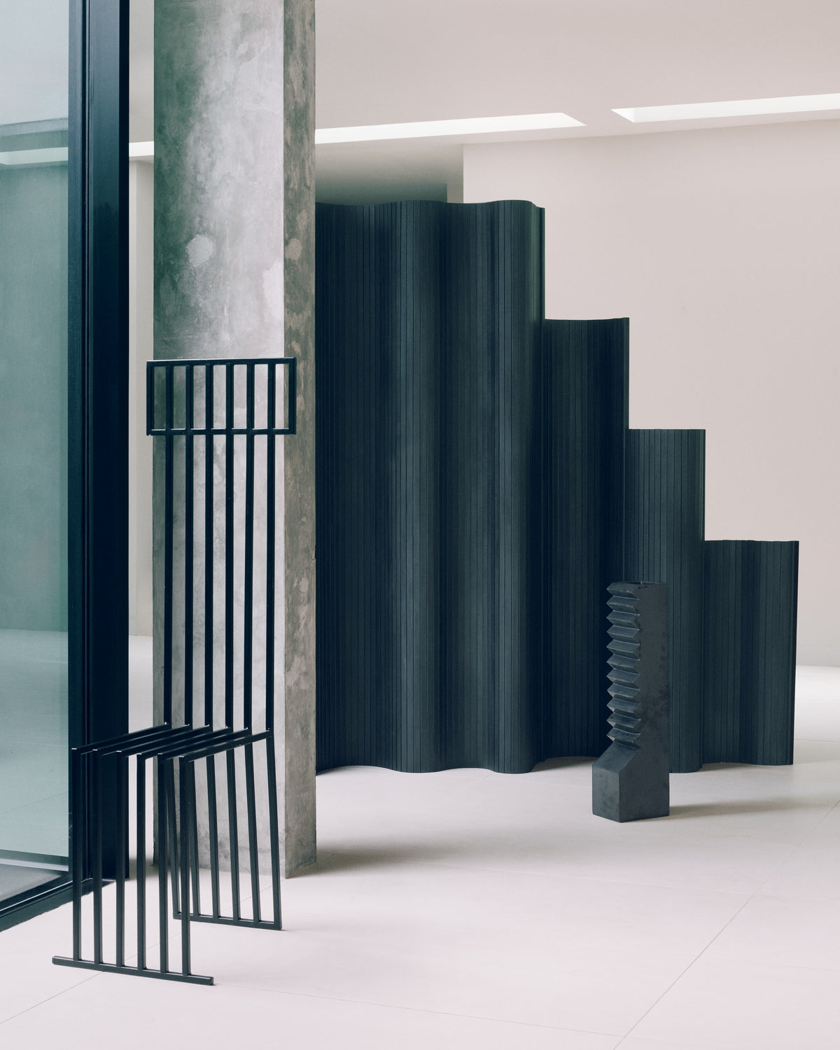 Sculptural Tambour Screen in Fumed Poplar by Tom Roberts — angled view in minimalist interior setting
