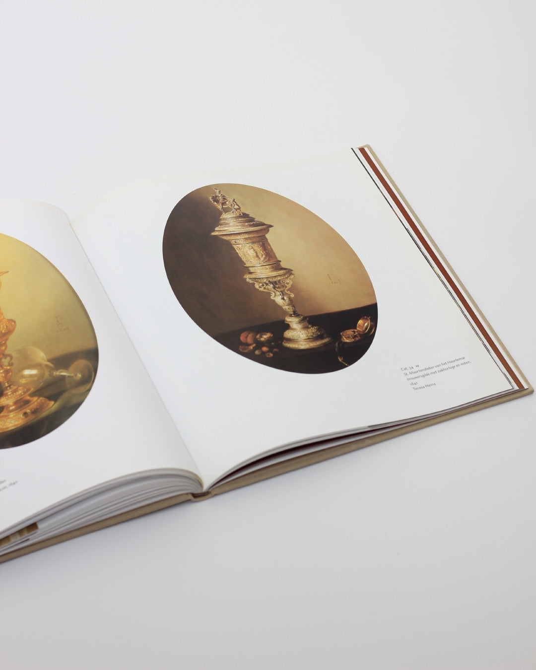 PIETER CLAESZ — open book showing detailed still life illustration