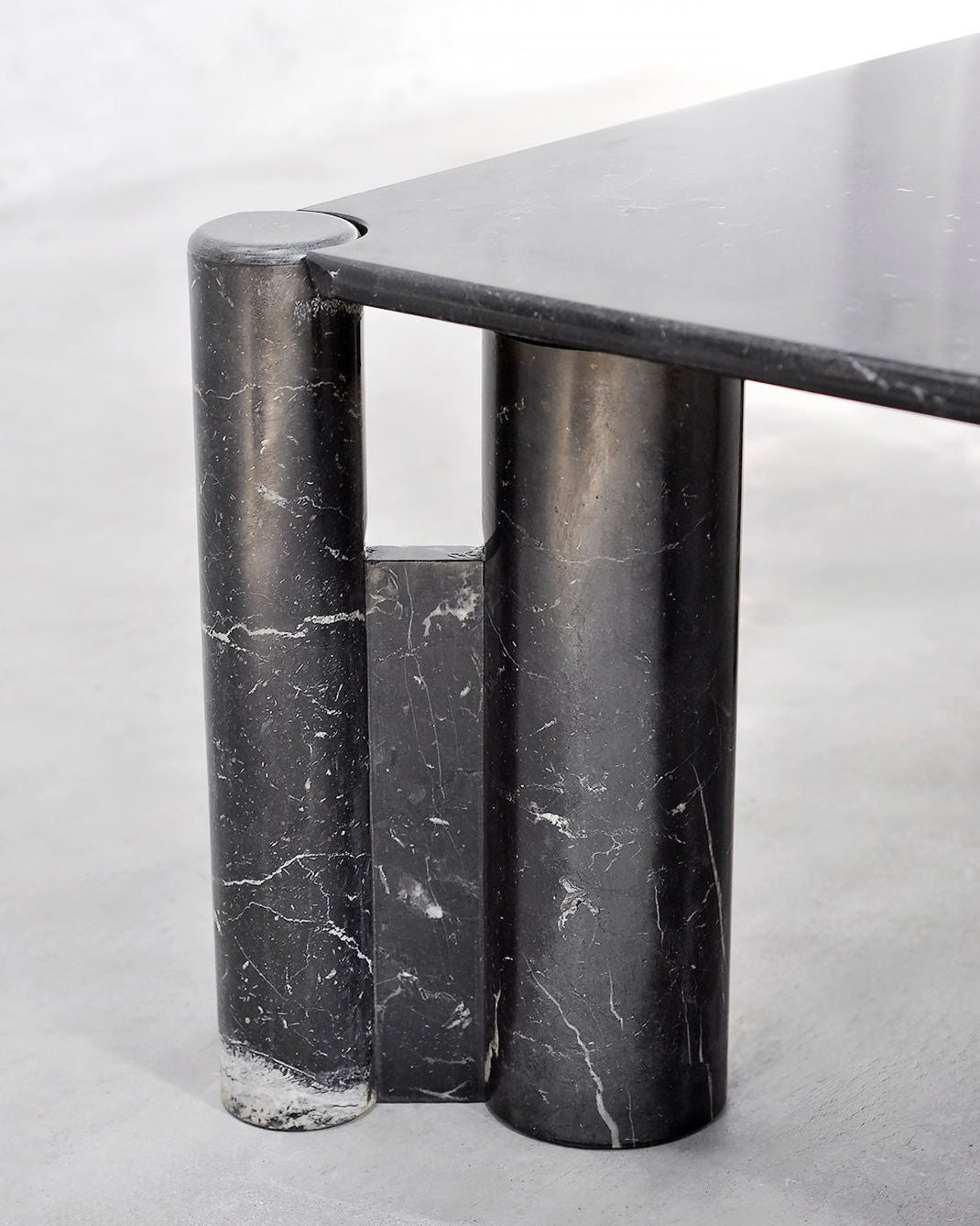 Detail view of marble coffee table cylindrical base structure