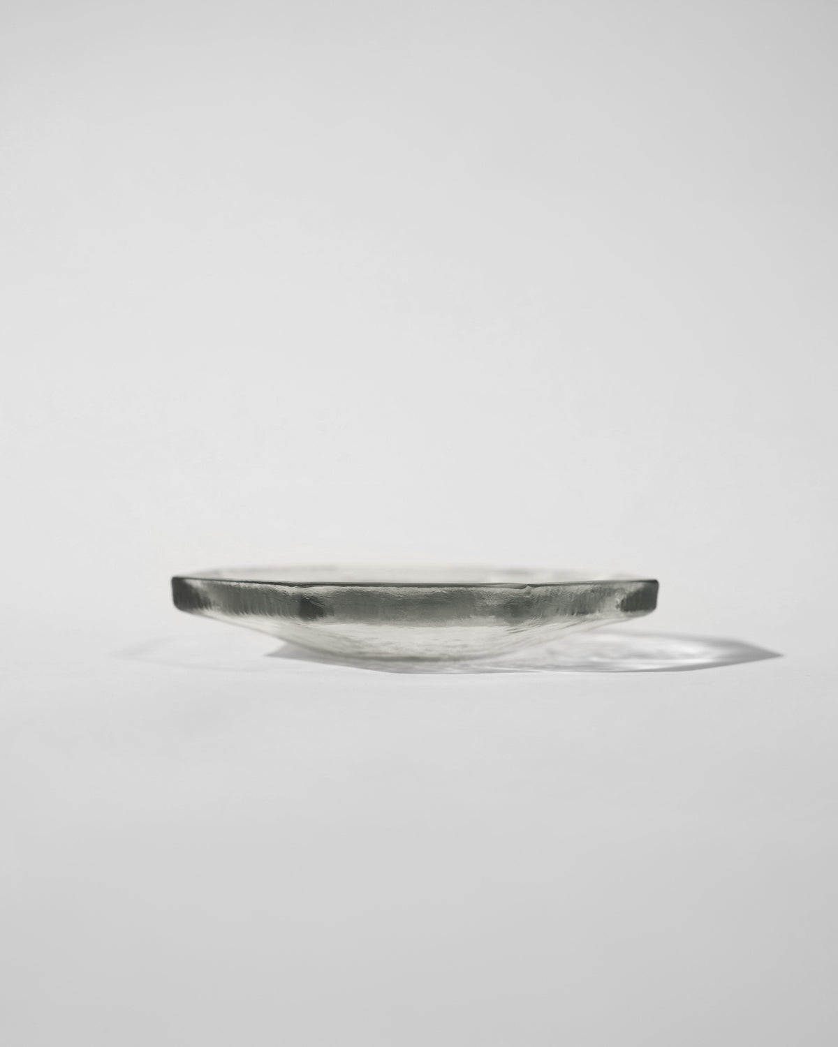 Agnes Plate - Set of two — side view highlighting clear glass material
