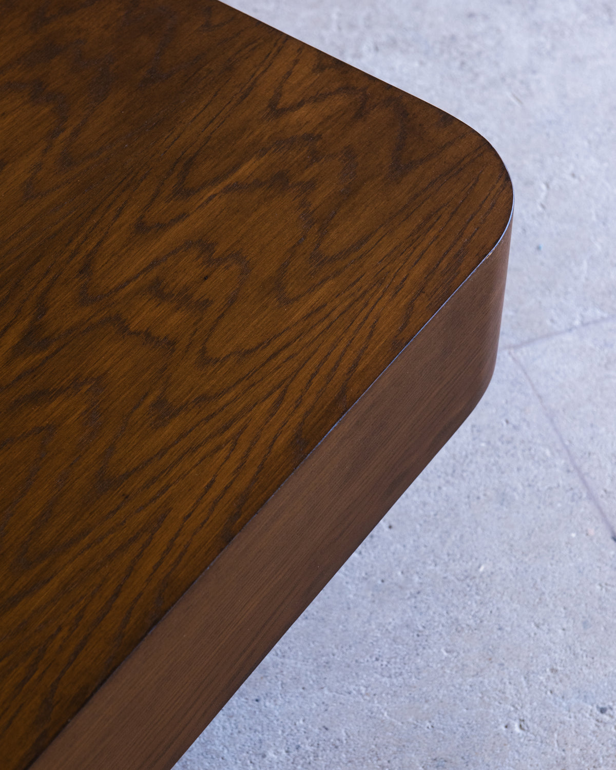 Chalette walnut coffee table corner detail showing wood grain