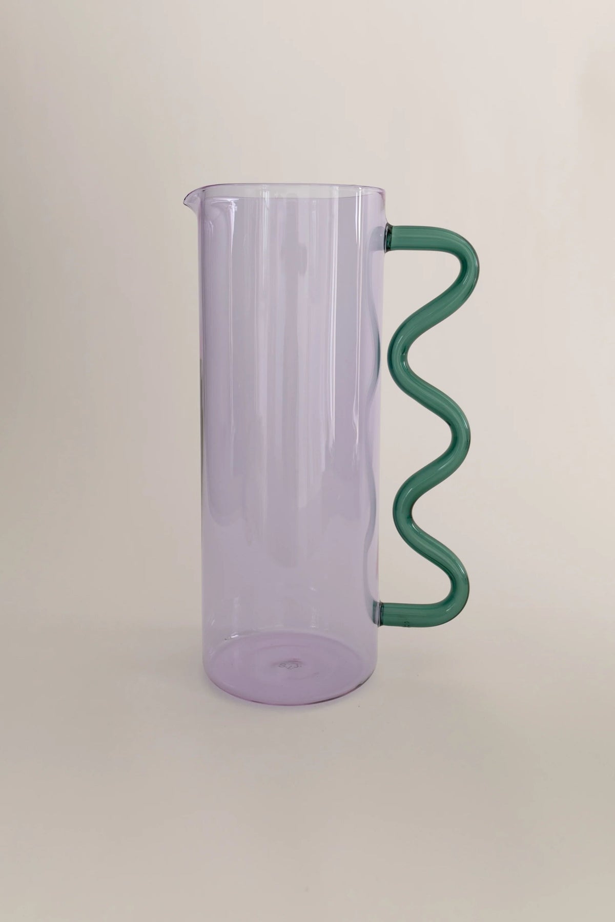 Wave Pitcher — side view showing purple body and green handle