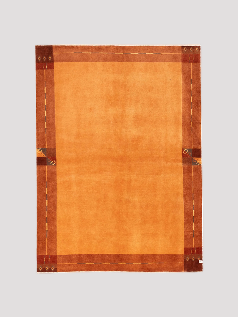 nepalese rug in ochre 170 x 234 cm by catalog:three | The Oblist