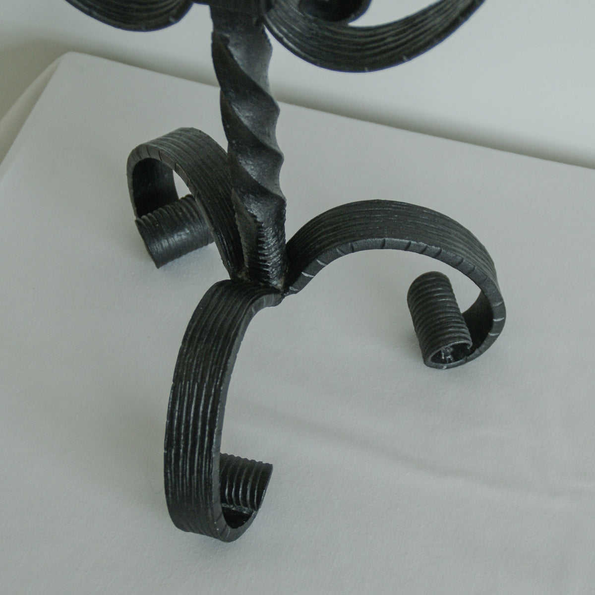 Tripod Cast Iron Candle Holder — close-up