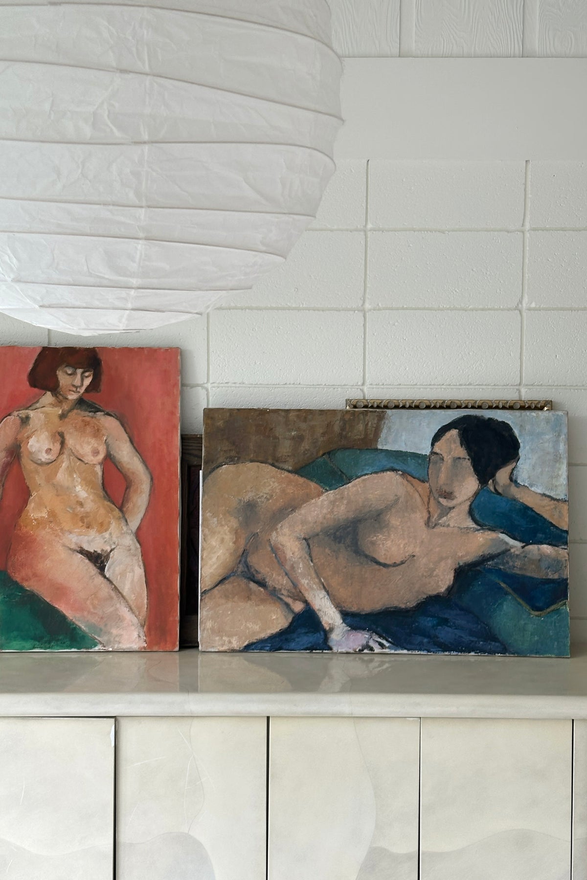 Reclining Nude, Original Painting by Sandra Orlovsky — angled view on marble surface