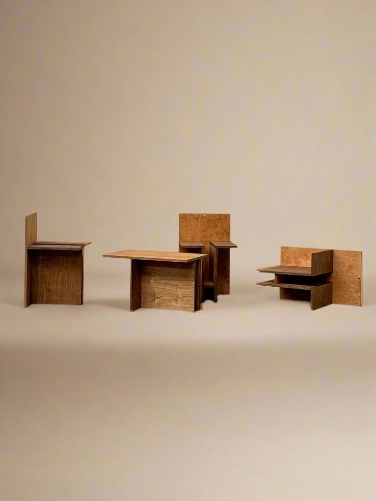 The "Sisto" Versatile Wood Chair by Edoardo Lietti Studio features minimalist geometric lines and a natural wood finish, providing elegant storage and display options in a neutral setting alongside other functional wooden pieces.