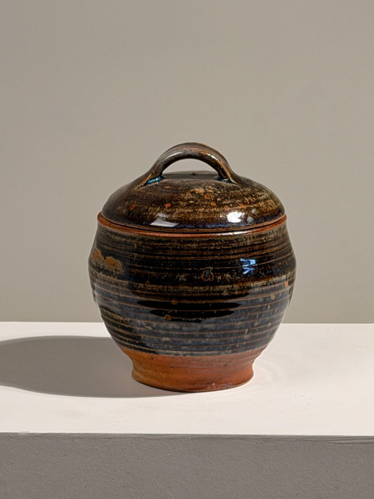 Covered stoneware pot, France, circa 1960 — detail view