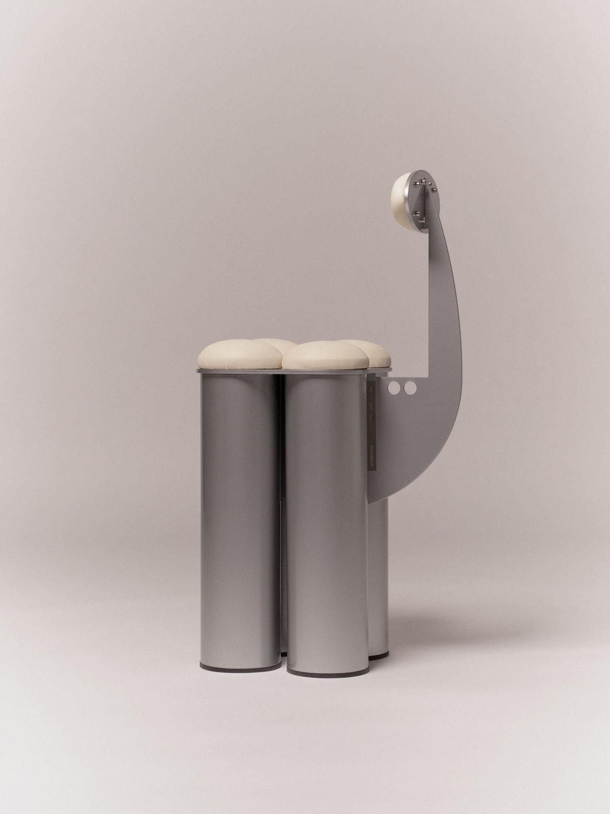 Giulio Stool — side view showing metallic base and round seat