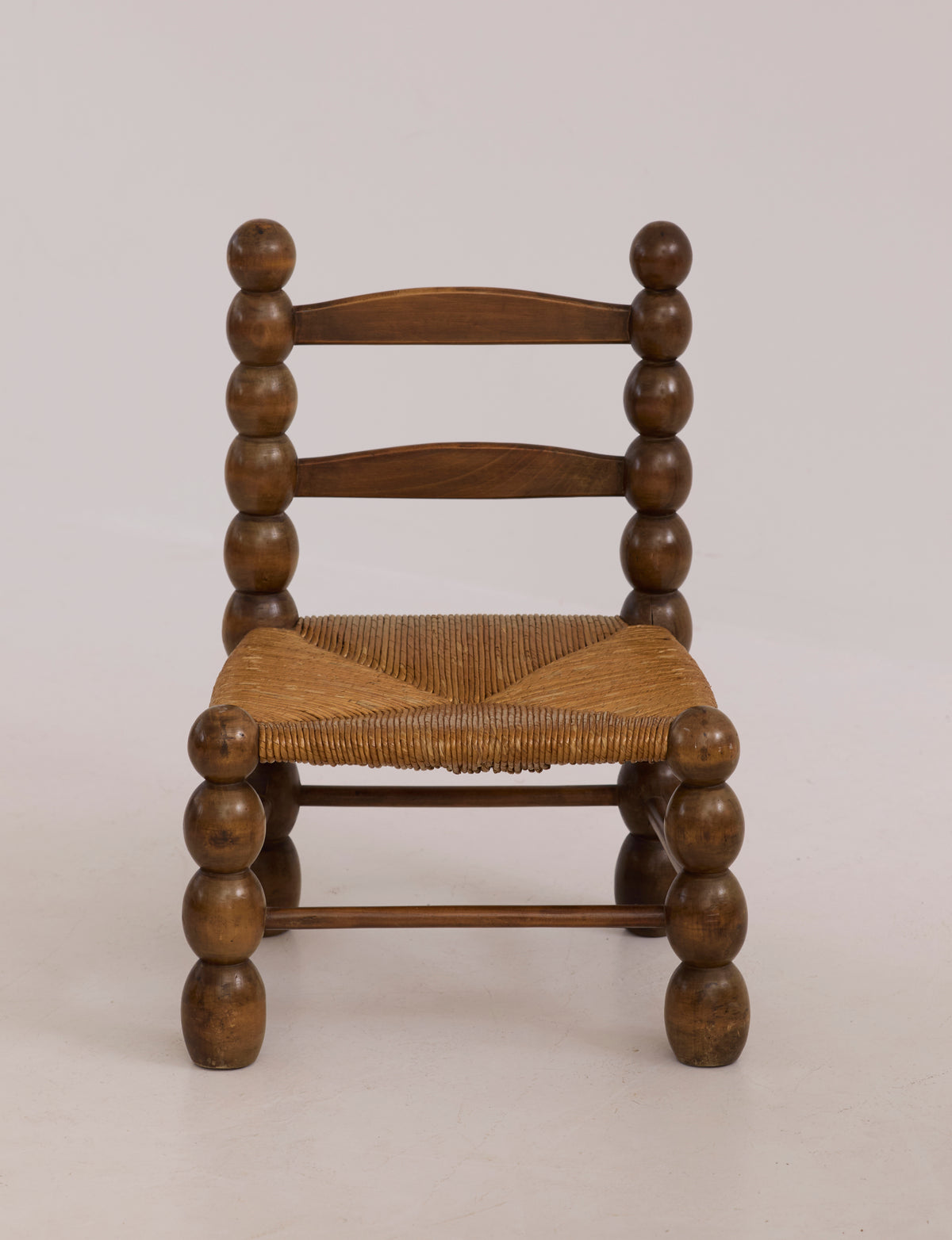 Vintage French Oak Wood and Straw Low Chair C. 1940 — top view of woven straw seat
