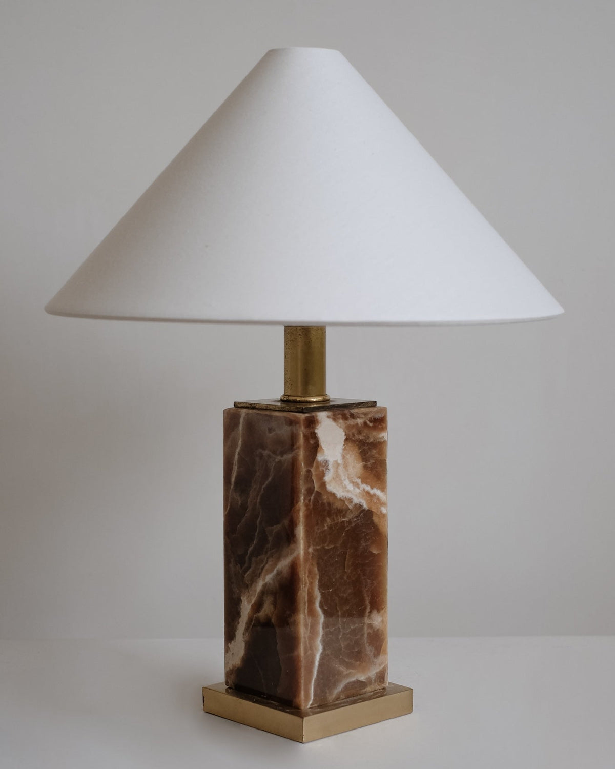 Onyx Table Lamp — close-up of onyx base with brass accents