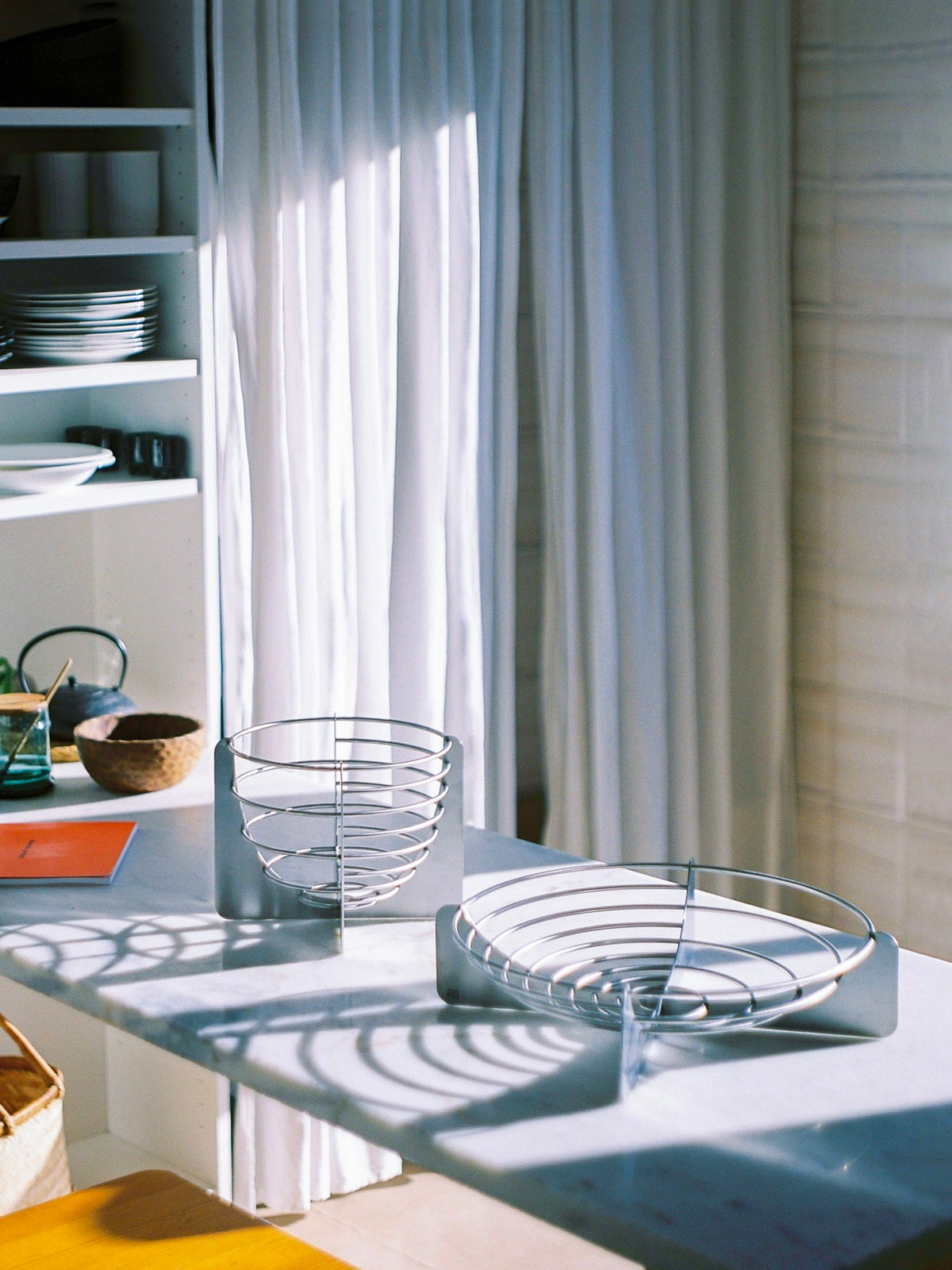 Draft Bowl Large — angled view on marble countertop in bright kitchen