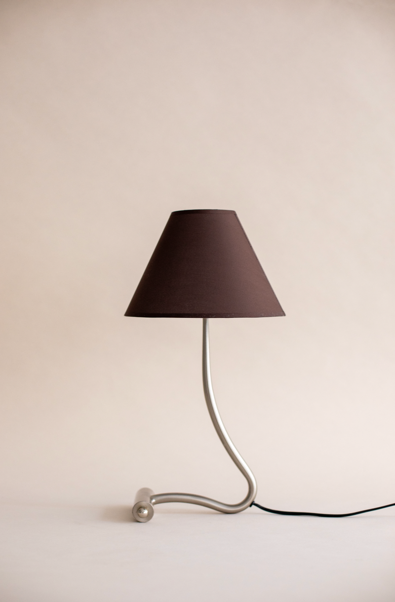 Tavira table lamp with curved metal stem and brown conical shade