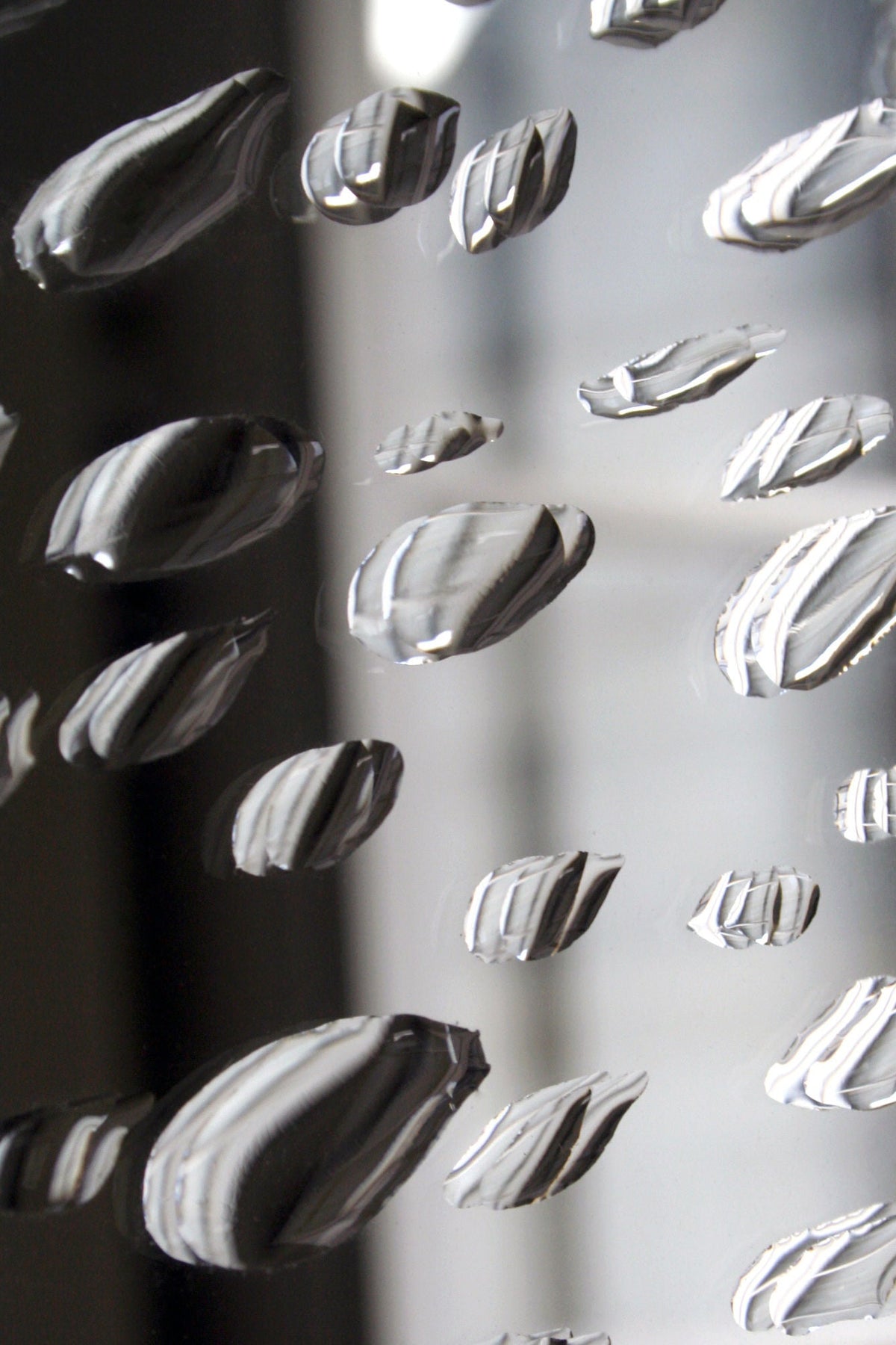 Mirror 11H20 — close-up of reflective surface with textured details