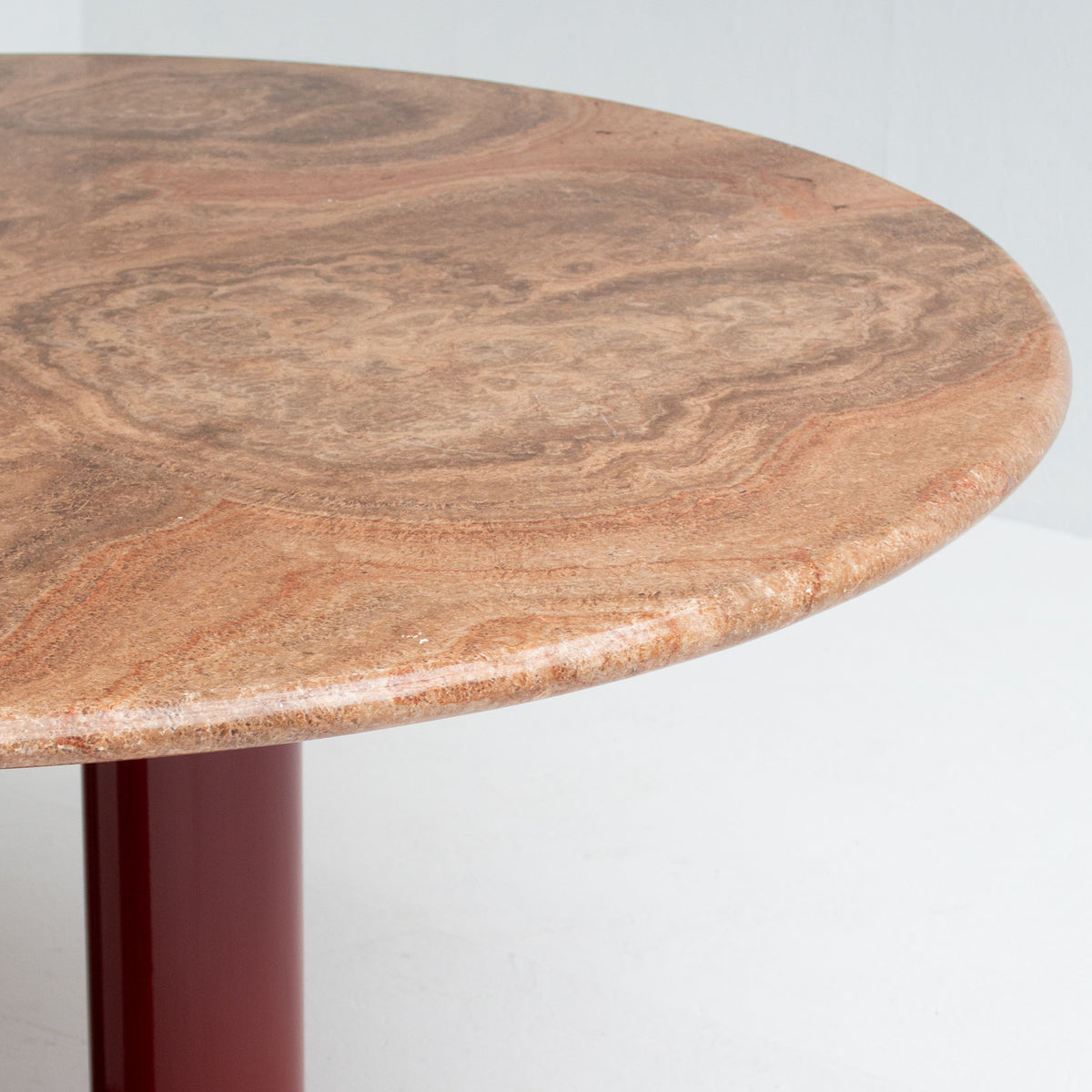 Round Marble Dining Table with Burgundy Lacquered Base — close-up of marble surface and lacquered base