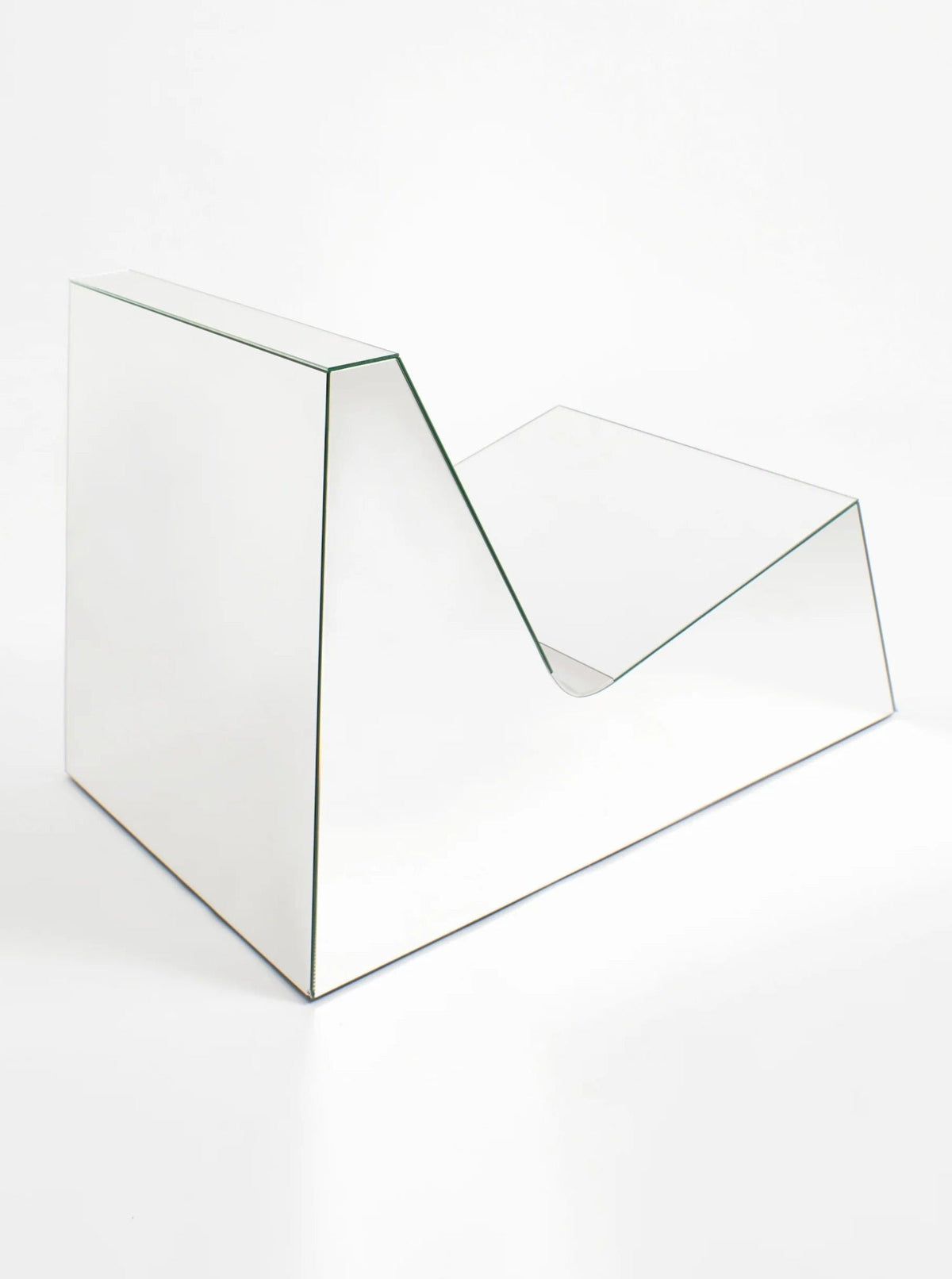 Mirror Lounge Chair — angled view highlighting reflective glass surface
