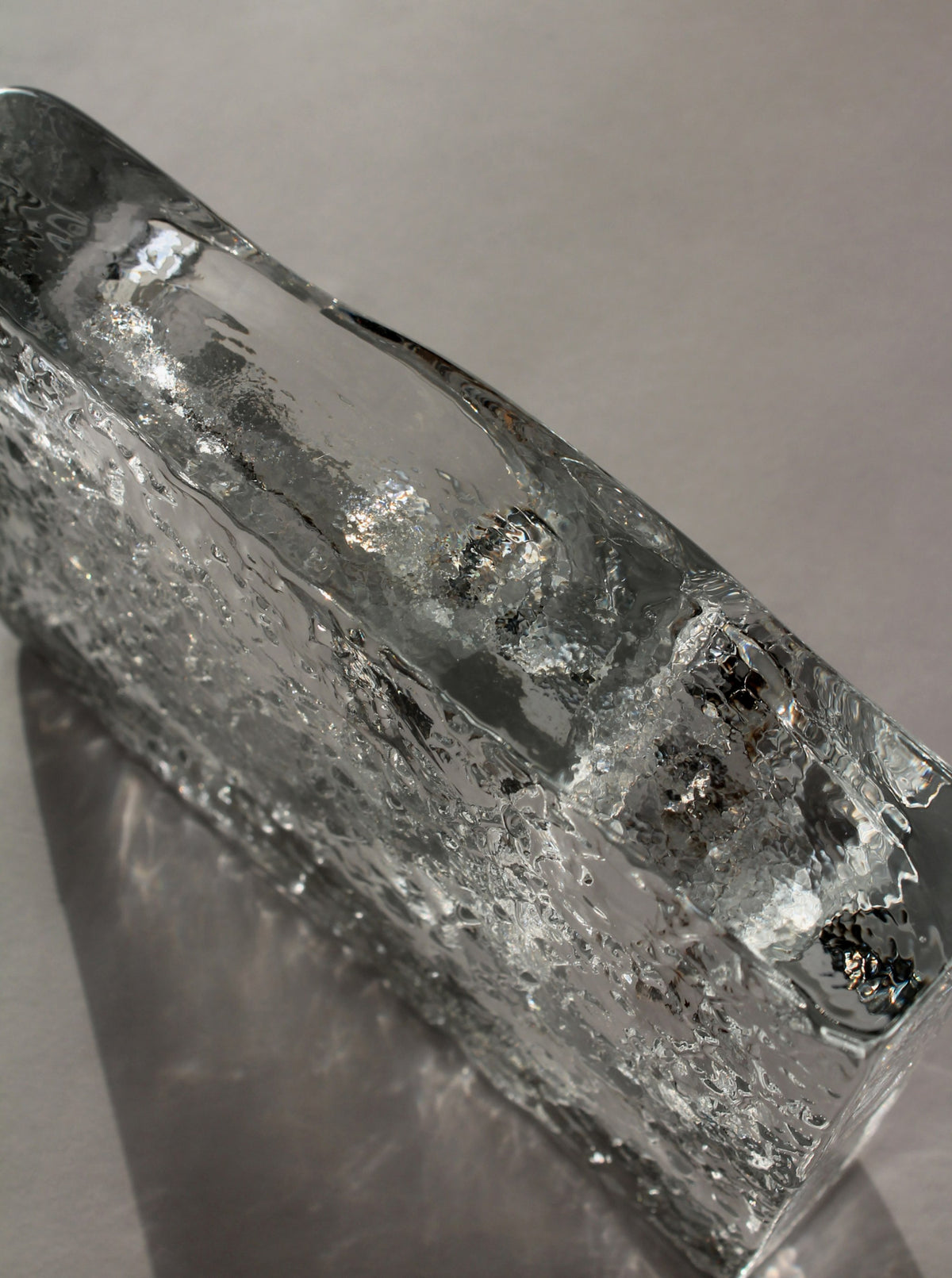 Close-up detail of Kosta Boda glass ashtray crystal texture