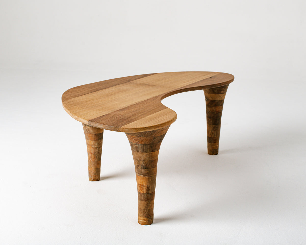 Organic Coffee Table — side angle showing wooden surface and legs