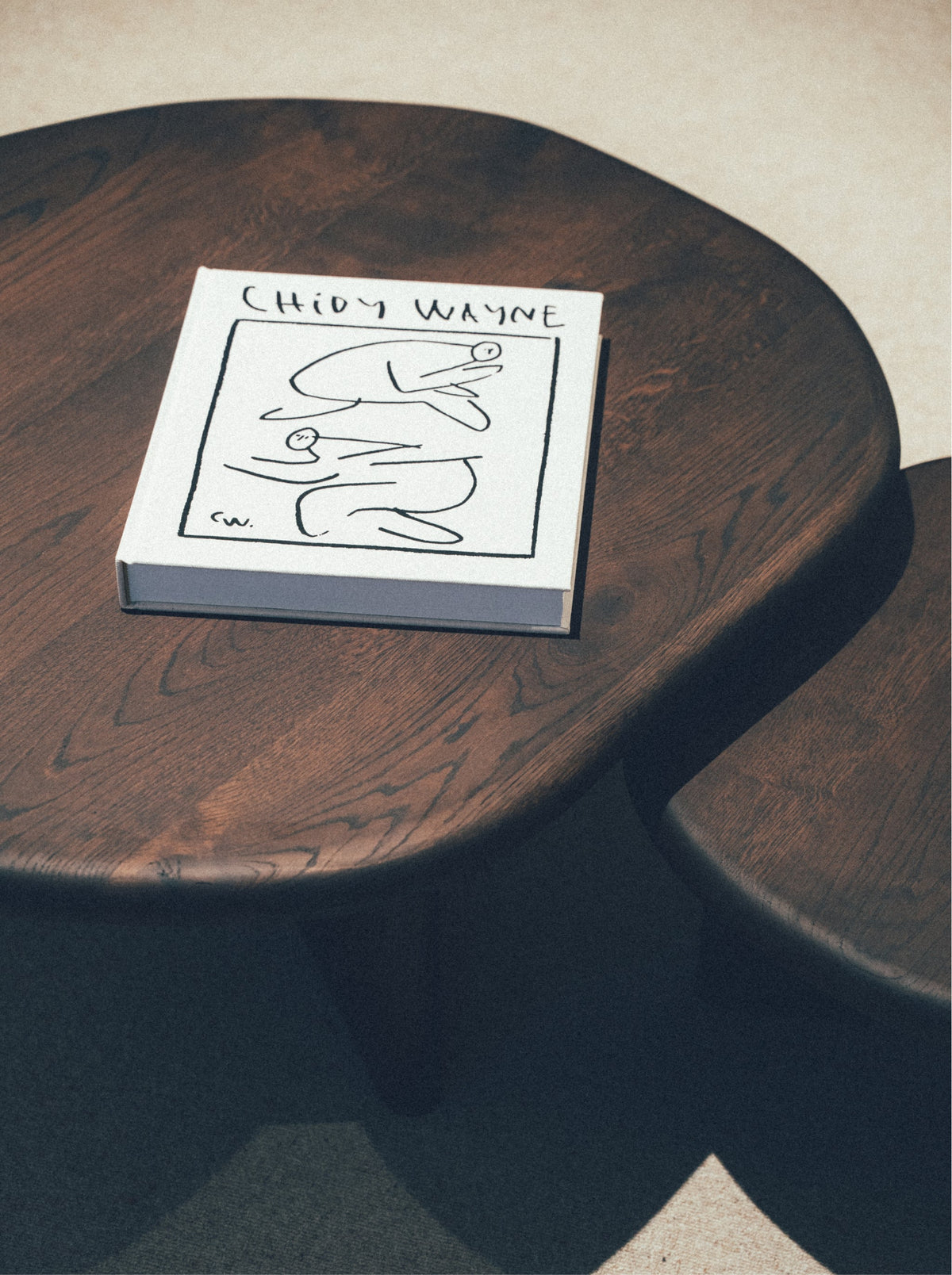 Coffee Table - Ed. Color Espresso - Oak — top view with art book on surface