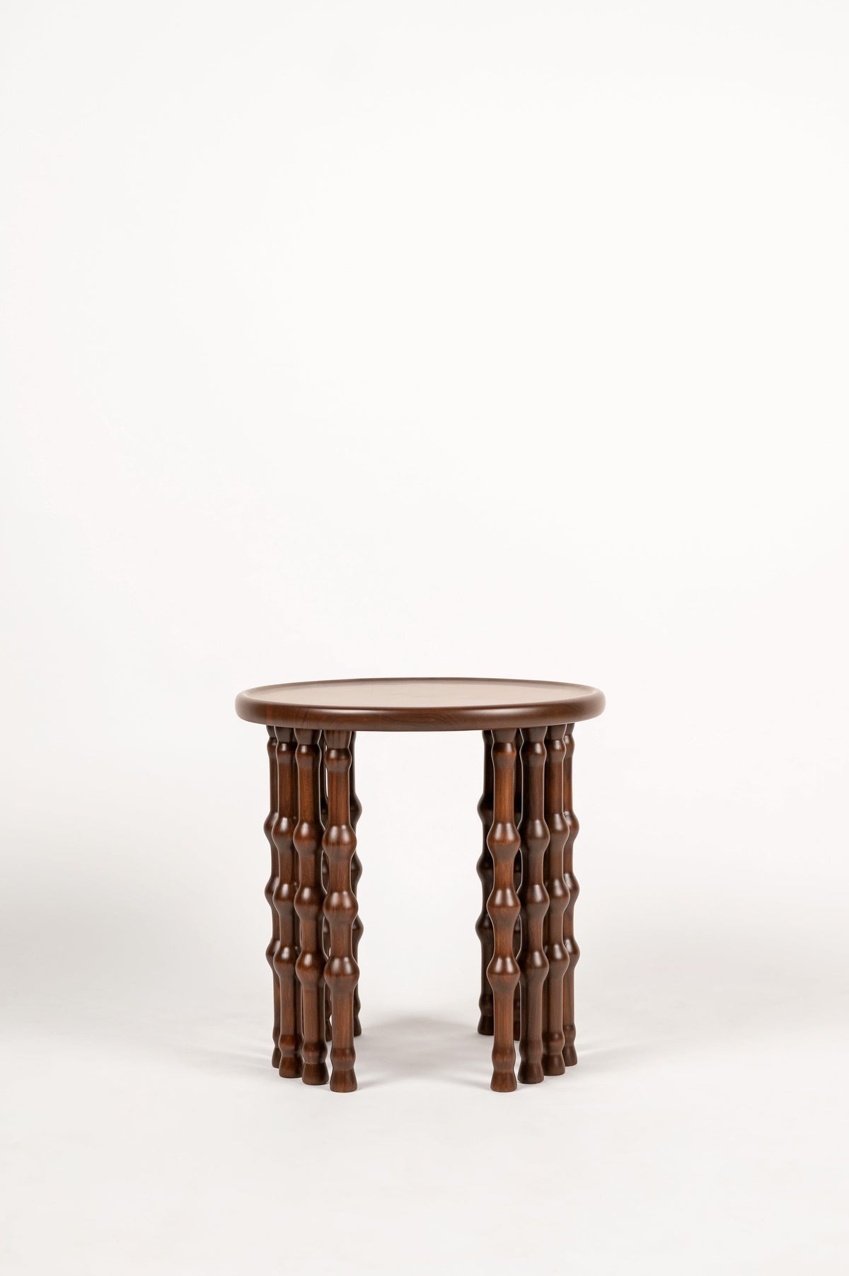 Arcus Side Table — front view with brown wooden legs
