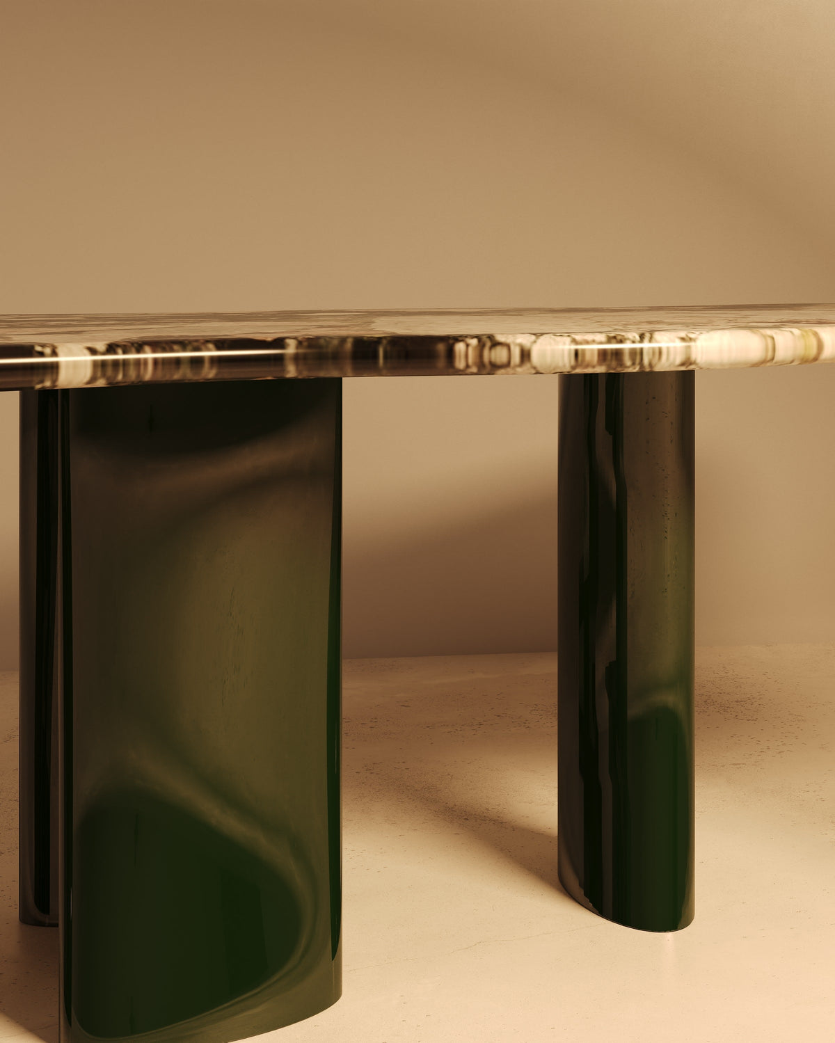 Detail view of MOJE marble dining table with curved dark green base