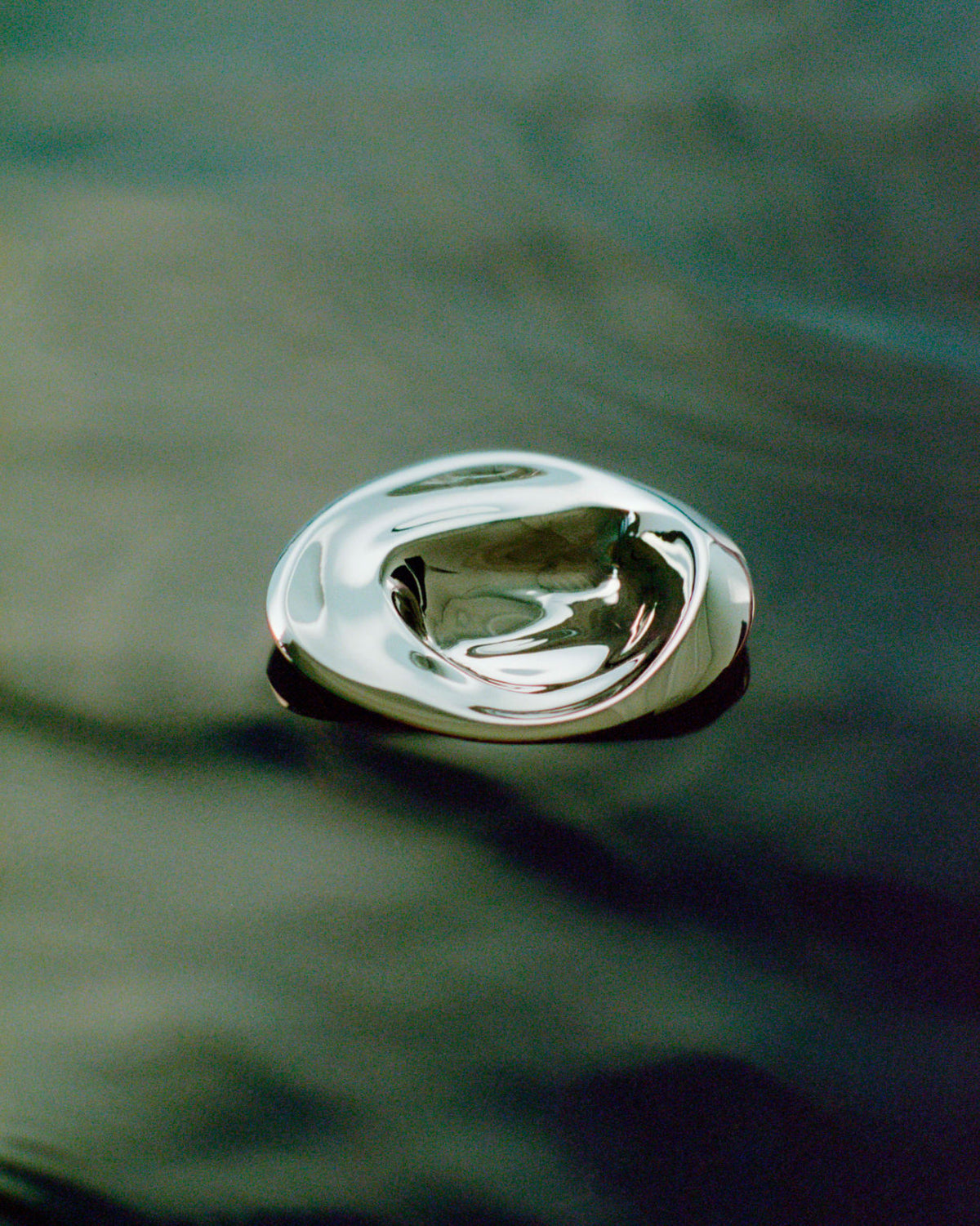 Ripple Hook - Large - Brass — close-up of reflective brass surface