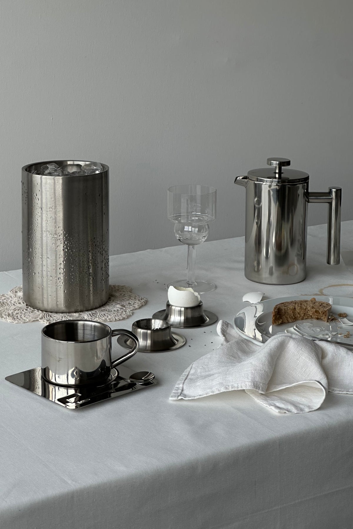 'HEDONISM' stainless steel cup with saucer — additional view