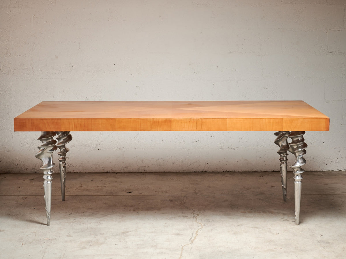 Post-Modern Table with Marquetry Top and Cast Aluminum Legs, 1980's — side view highlighting cast aluminum legs