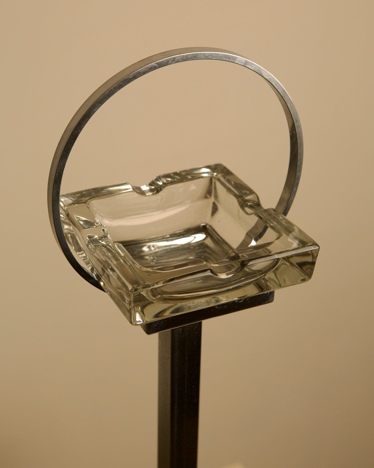 Italian Crystal Ashtray on a Chromed Metal Stand, 1950s — close-up of glass ashtray with metal ring