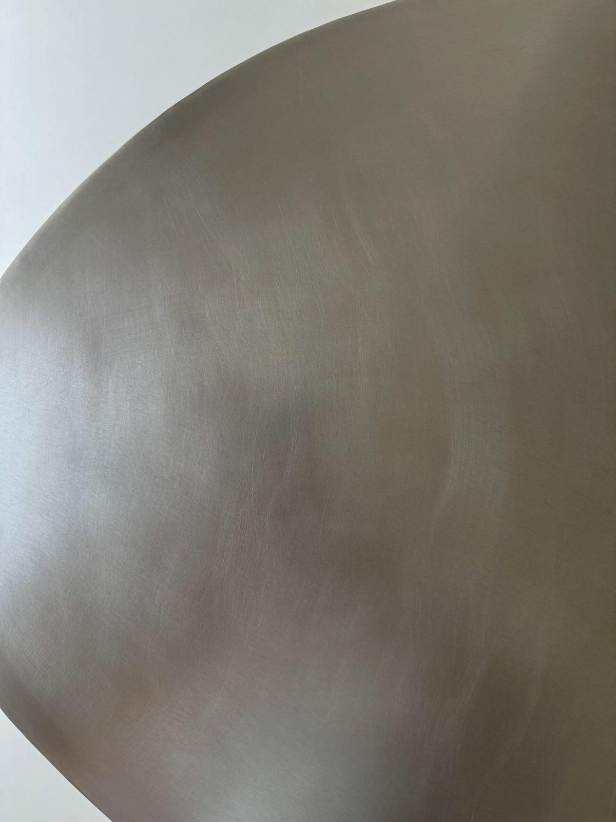 Contemporary Dining Table - Stainless Steel Collection — side angle of brushed stainless steel surface