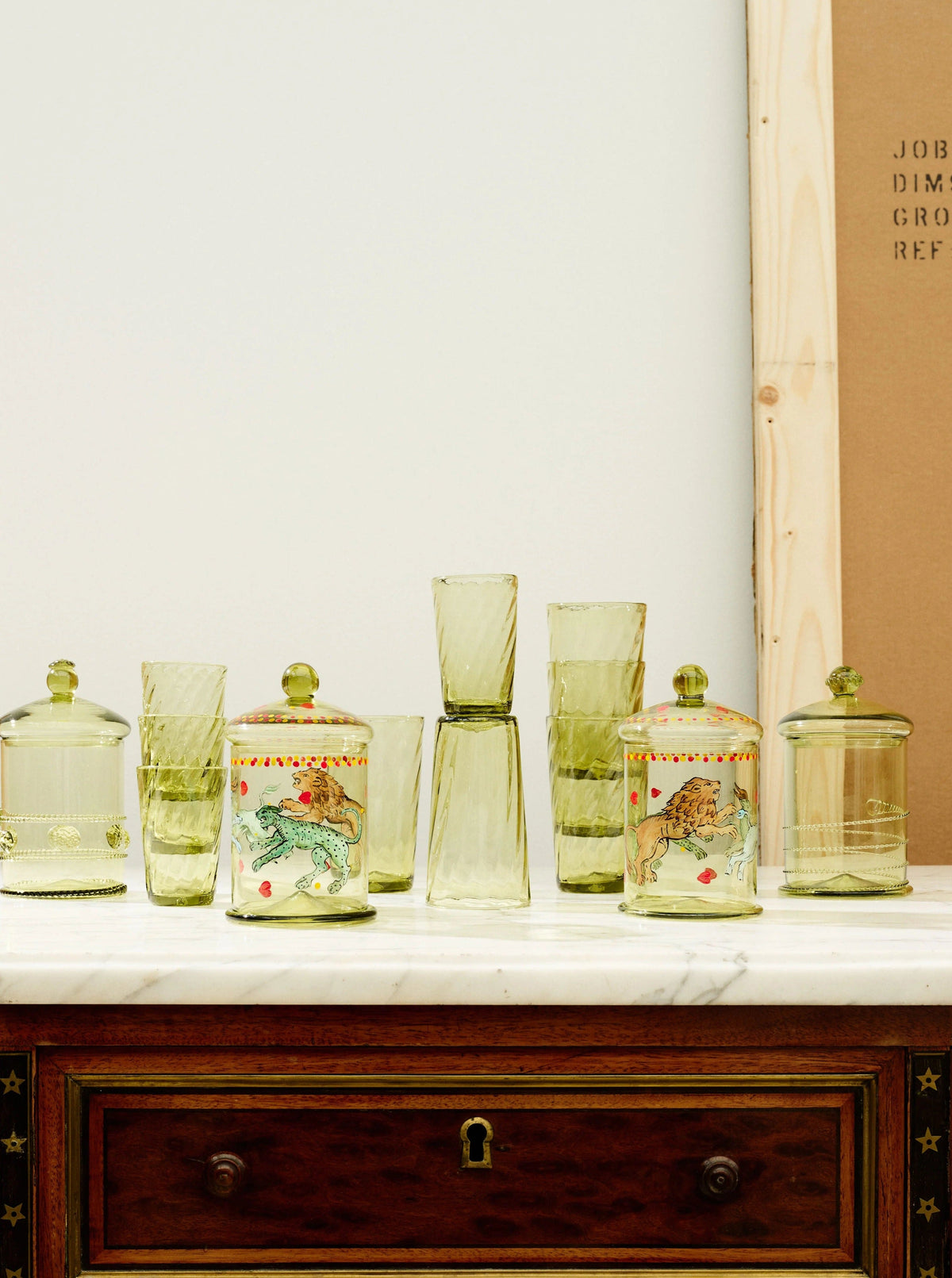 Karl Bonbonnière Dots — side angle of green glass jars on marble