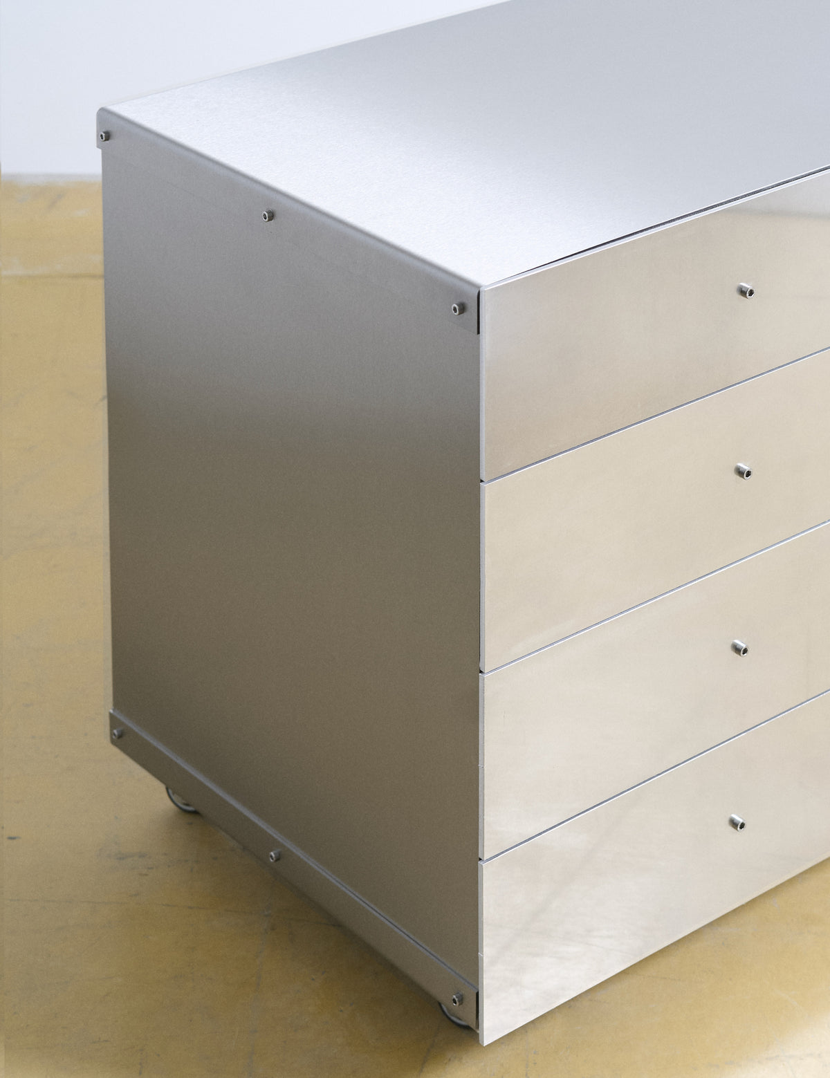 Chest of Drawers — back view showing silver metal finish