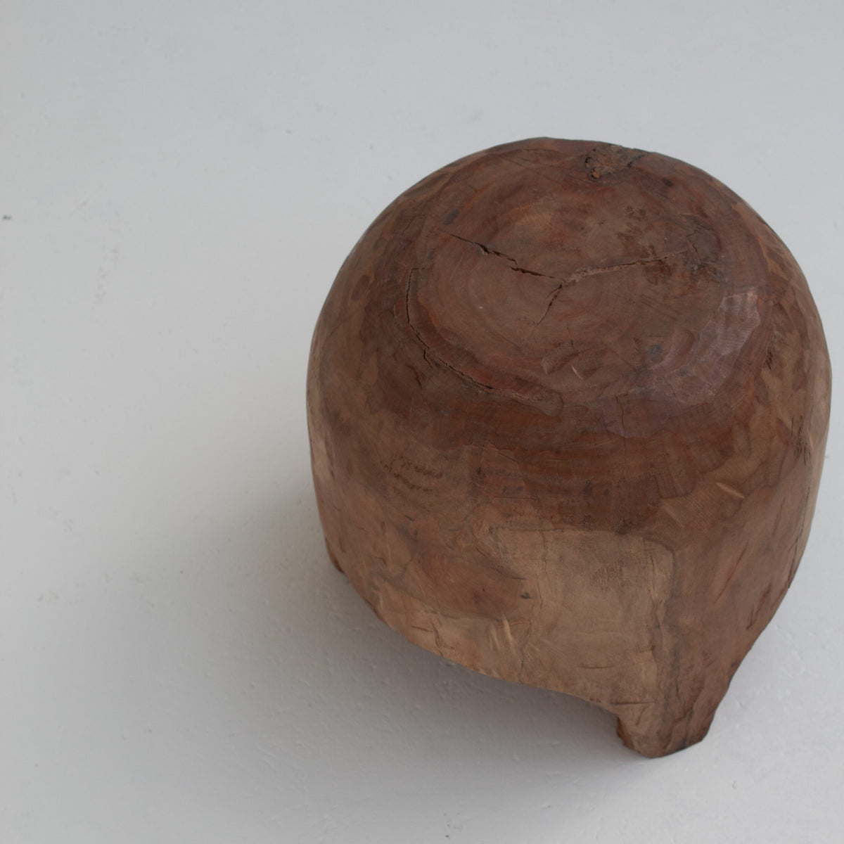 Sculptural Solid Wood Stool in Warm Natural Patina — close-up
