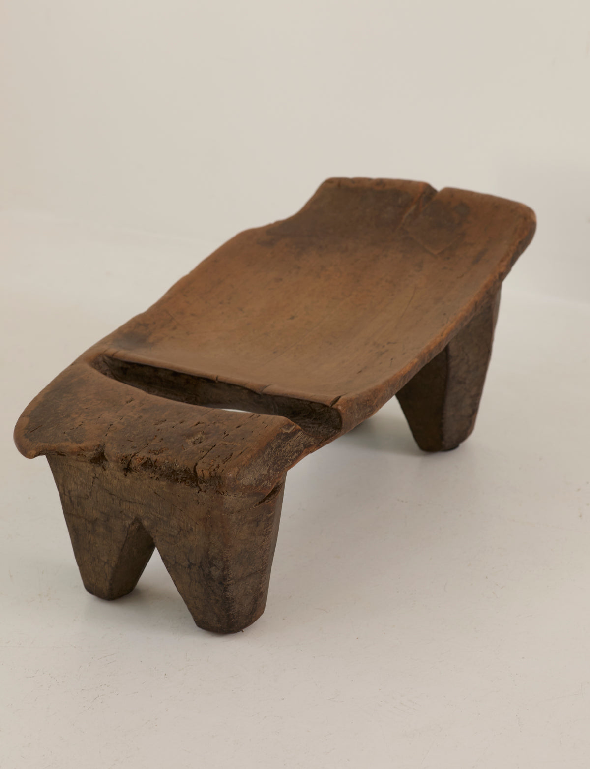 Mid-Century African Senufo Stool in solid wood — top view showing natural wood grain