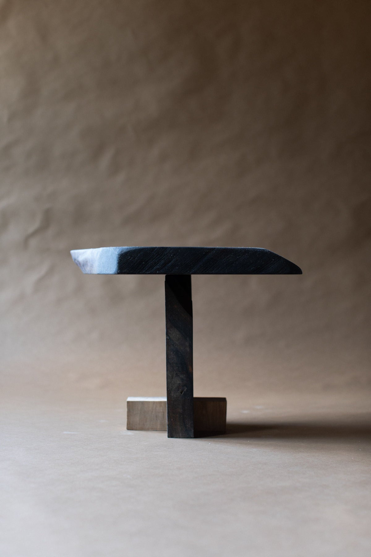 Black wooden Qawha side table with geometric T-shaped base