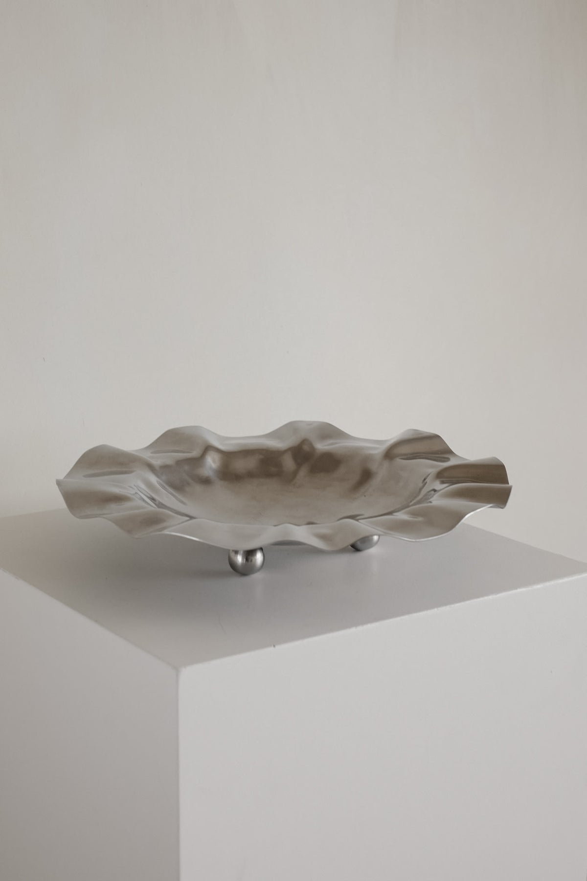 Wavy Display Bowl with Ball Feet — in context