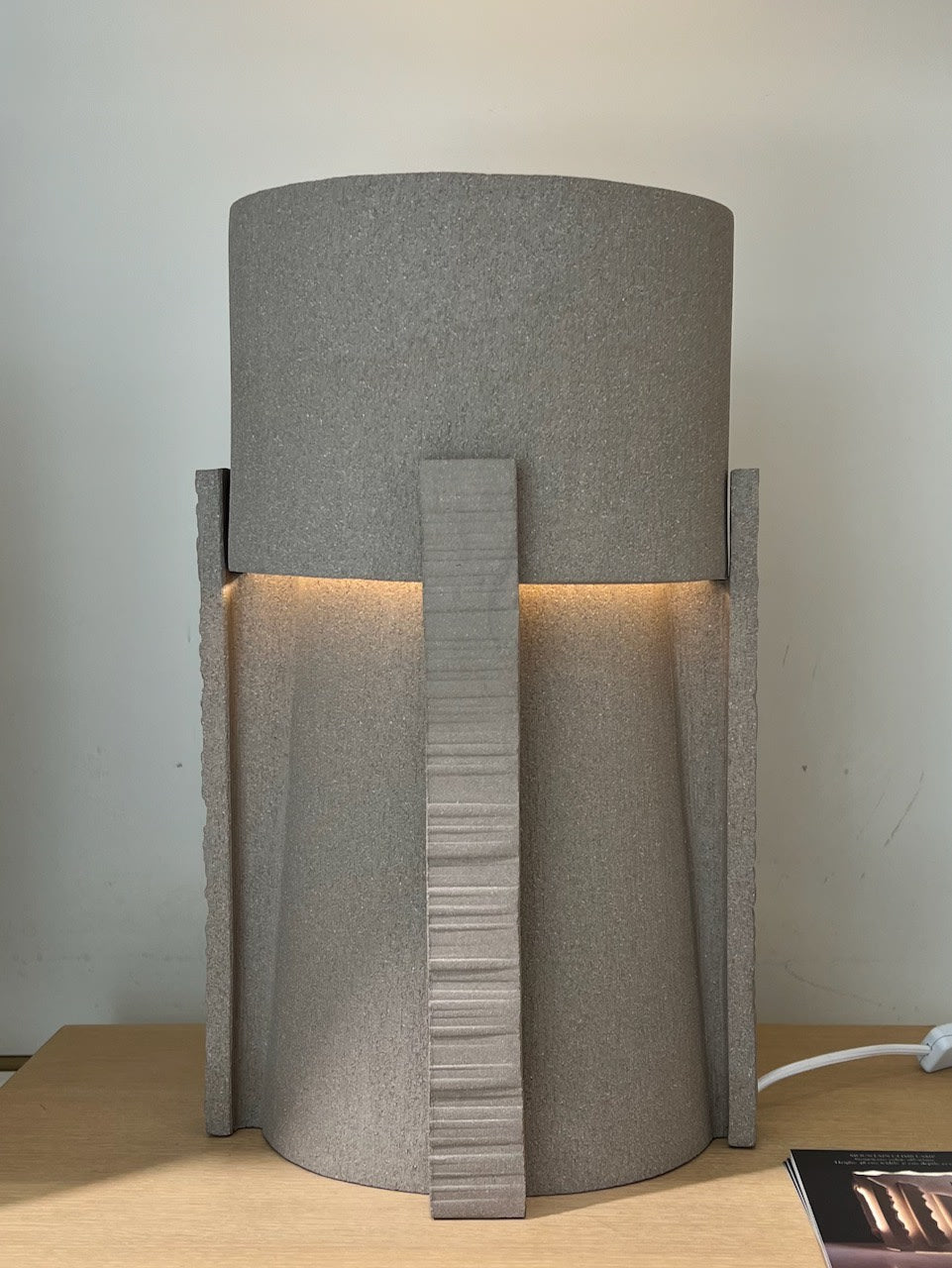Architectural ceramic table lamp with vertical ribbed detailing