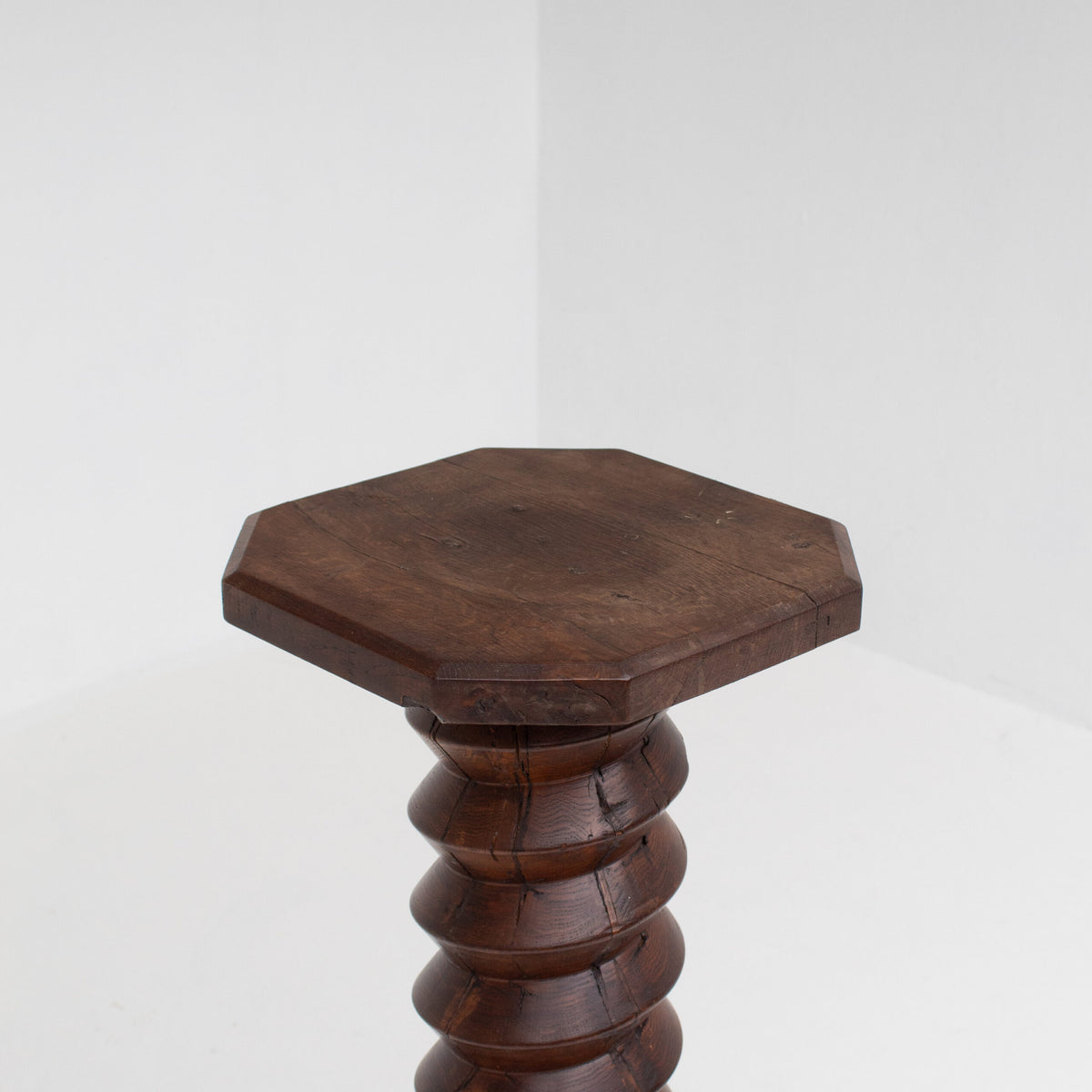 Brutalist Hand-Carved Wooden Pedestal in Solid Oak — lifestyle setting