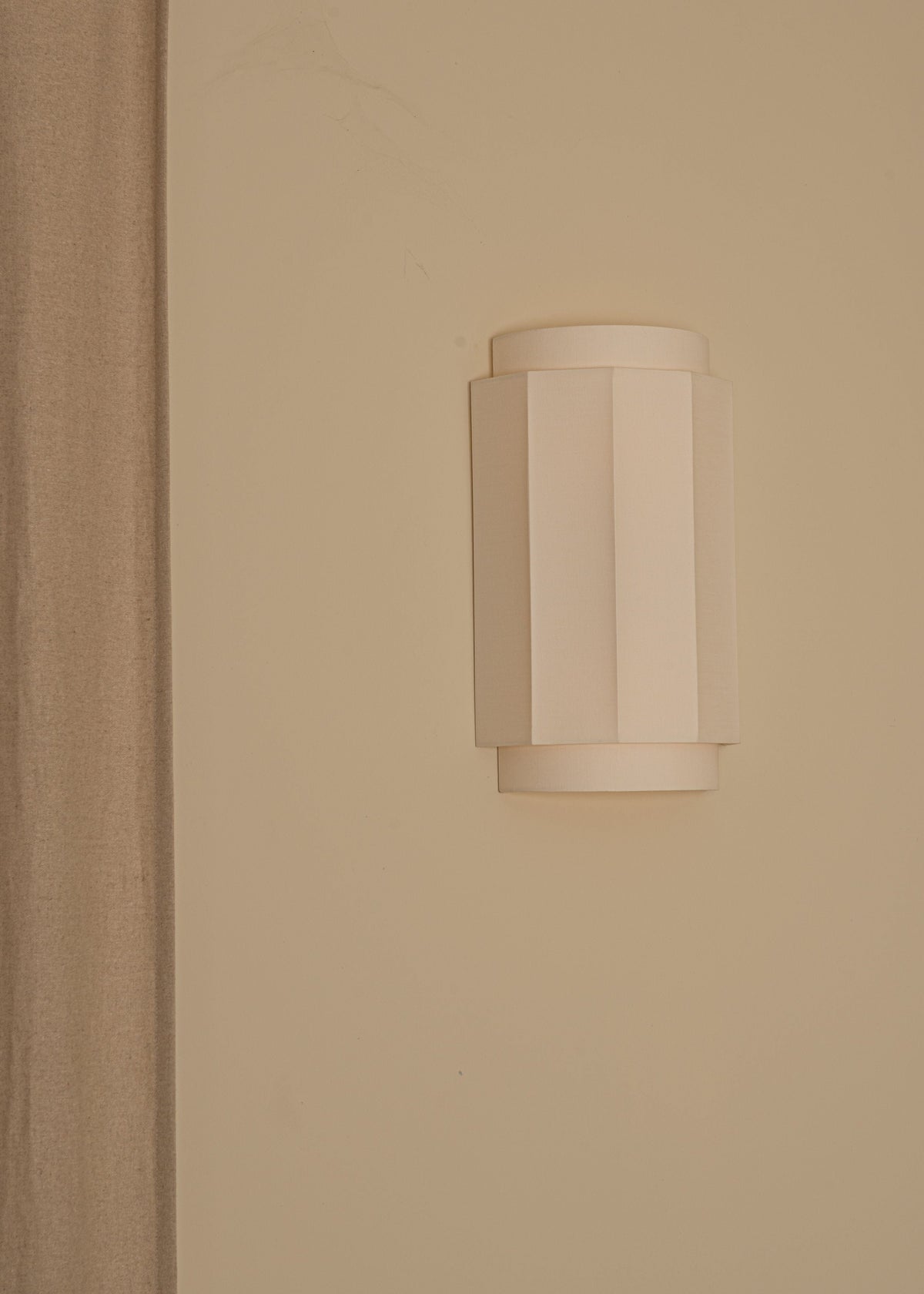 'Okla' Wall Light in Ecru Cotton — side angle