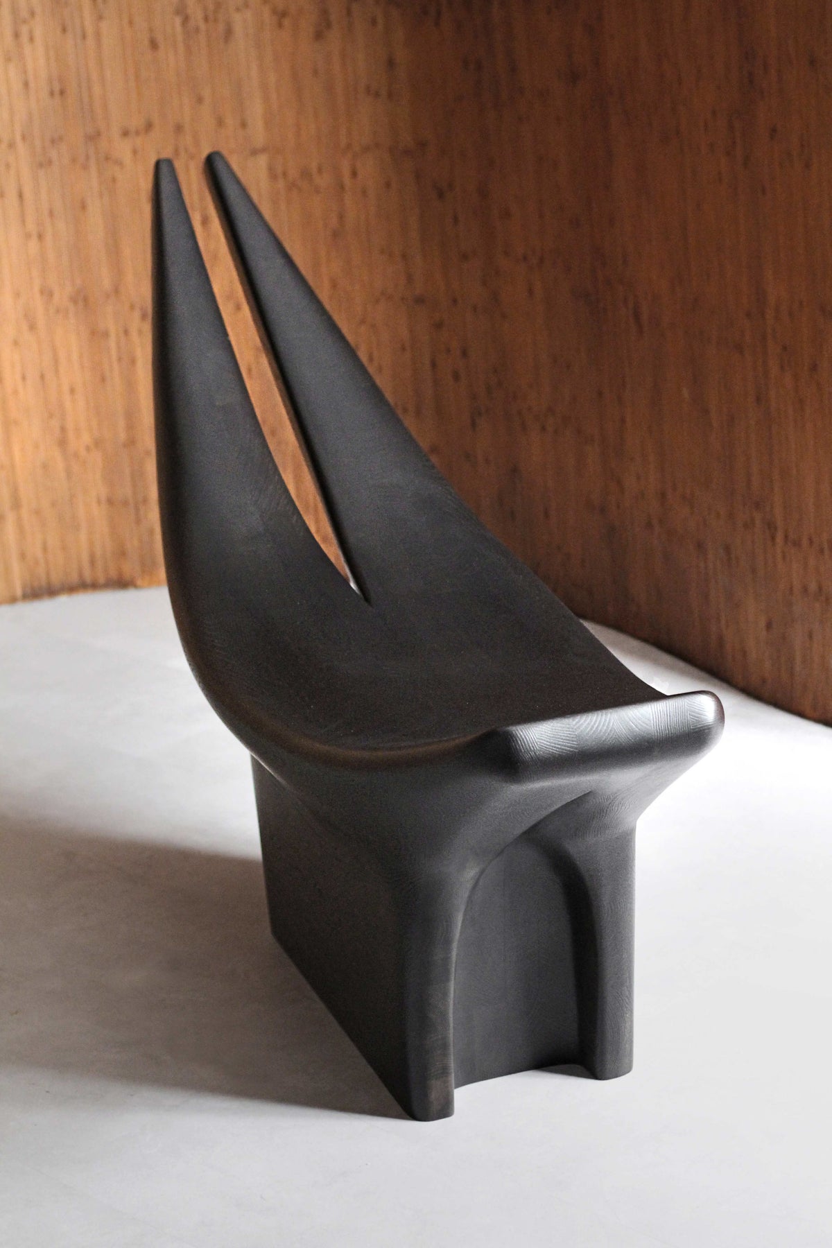 Dym Lounge Chair — top view of black sculptural seat