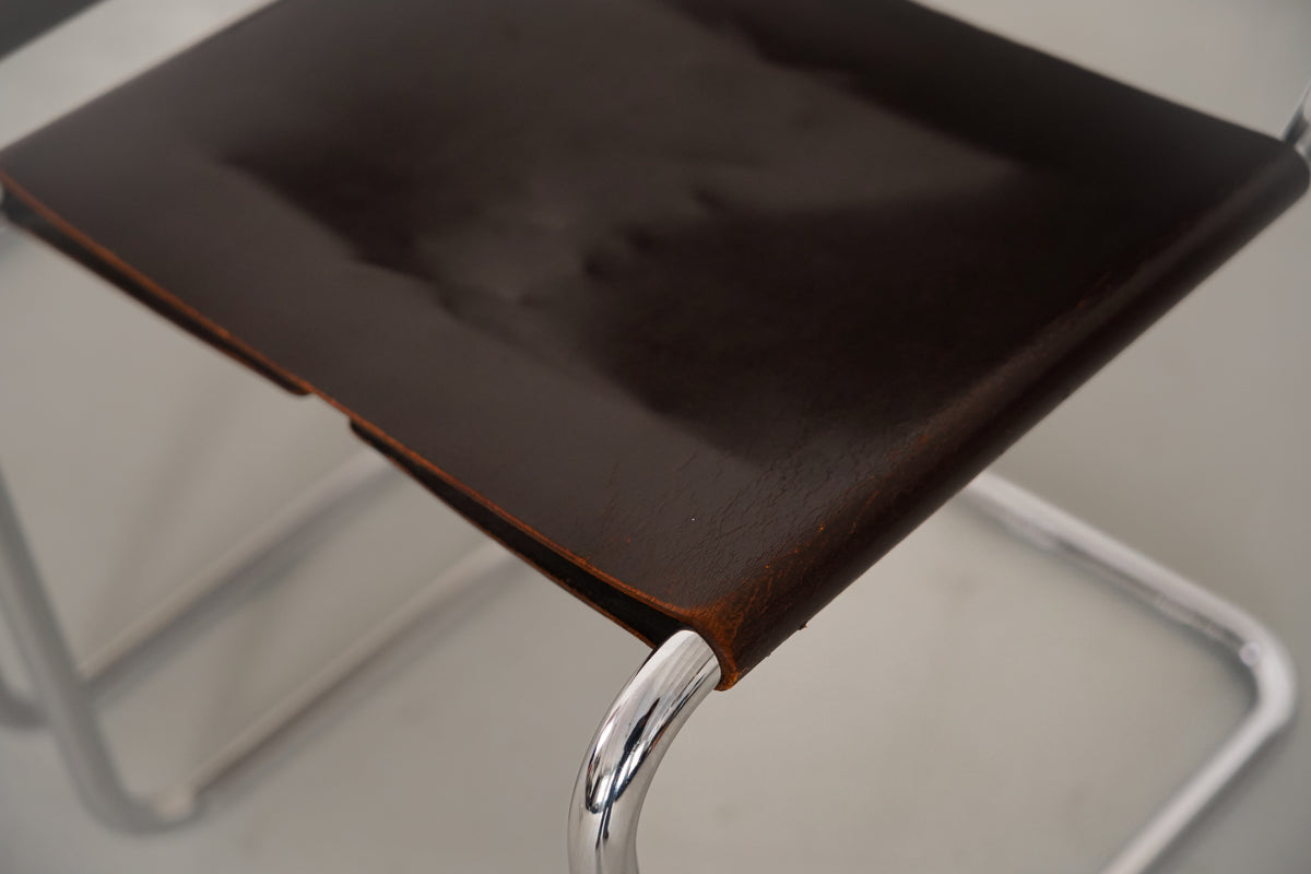 Close-up detail of B33 cantilever chair seat and chrome frame