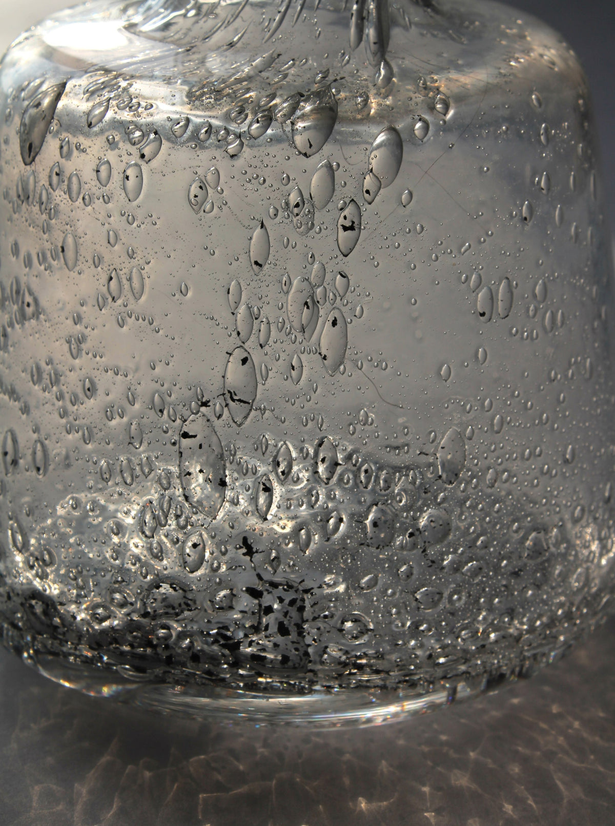 Close-up detail of bubbled glass texture on Swedish vase