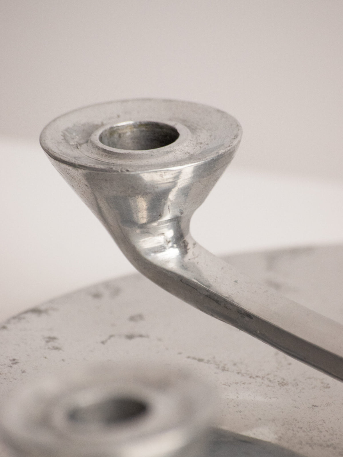 Rotating Five Arm Star Candleholder in Sand Cast Aluminium, Brutalist Europe 1960s to 1970s — close-up