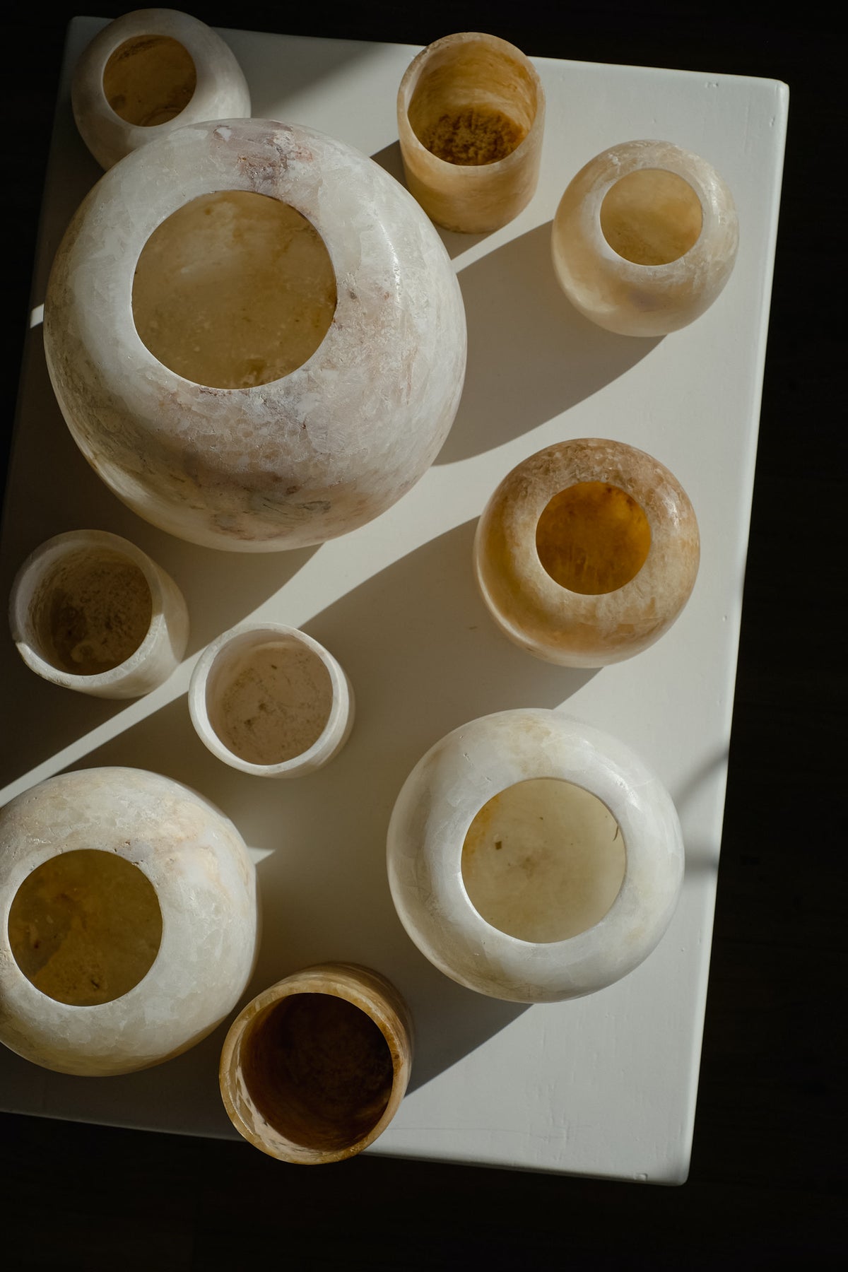Alabaster Candle Holder — top view of various sizes on white surface