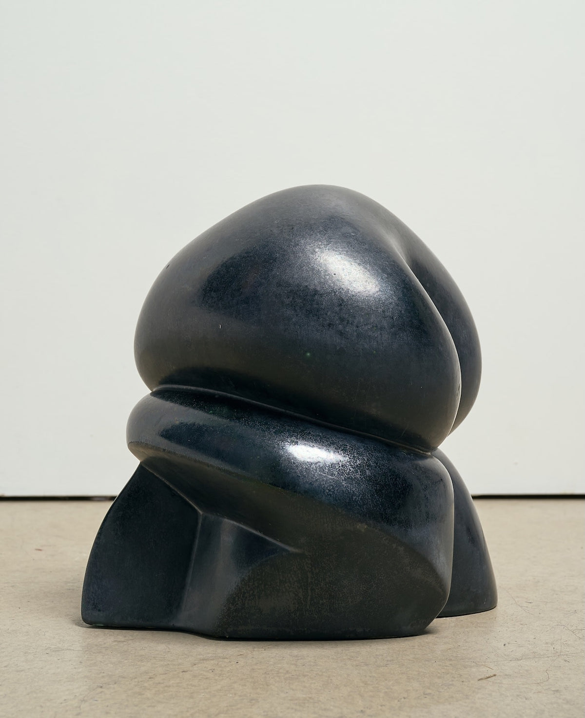 Black ceramic sculpture by Richard Graham, circa 1980 — side angle