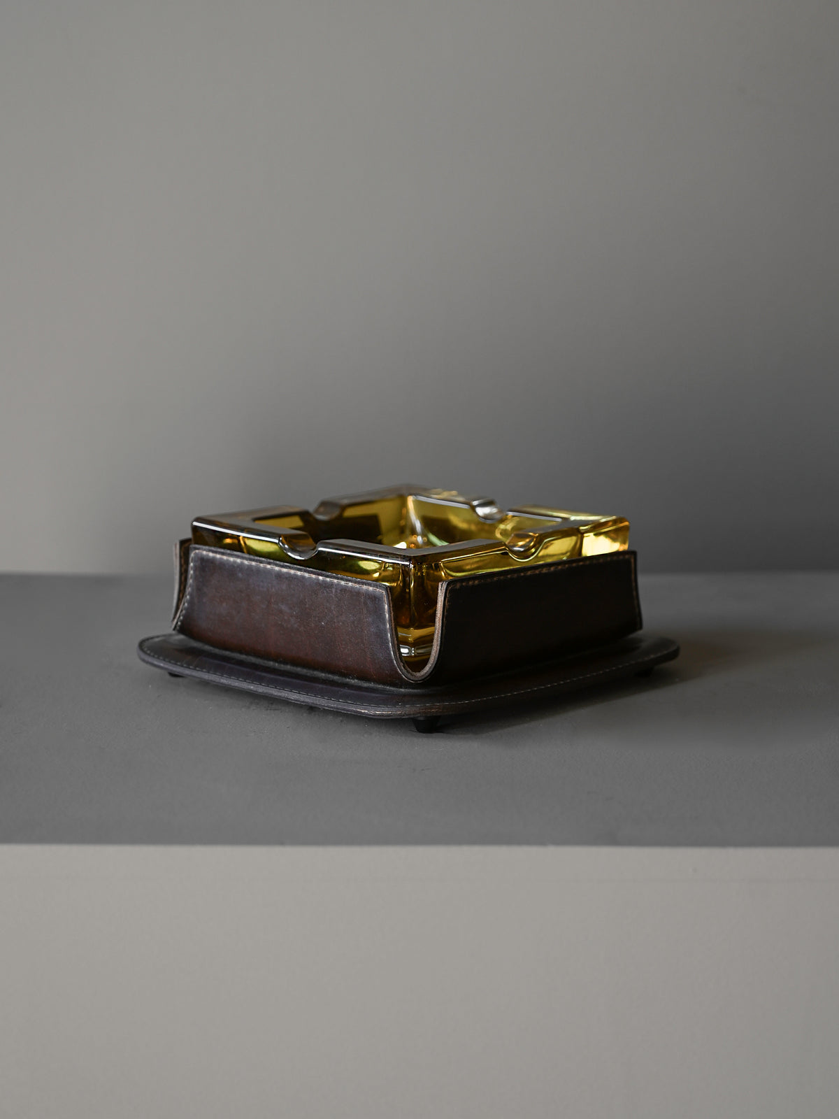 Cast-Glass and Leather Ashtray attributed to Jacques Adnet — detail view
